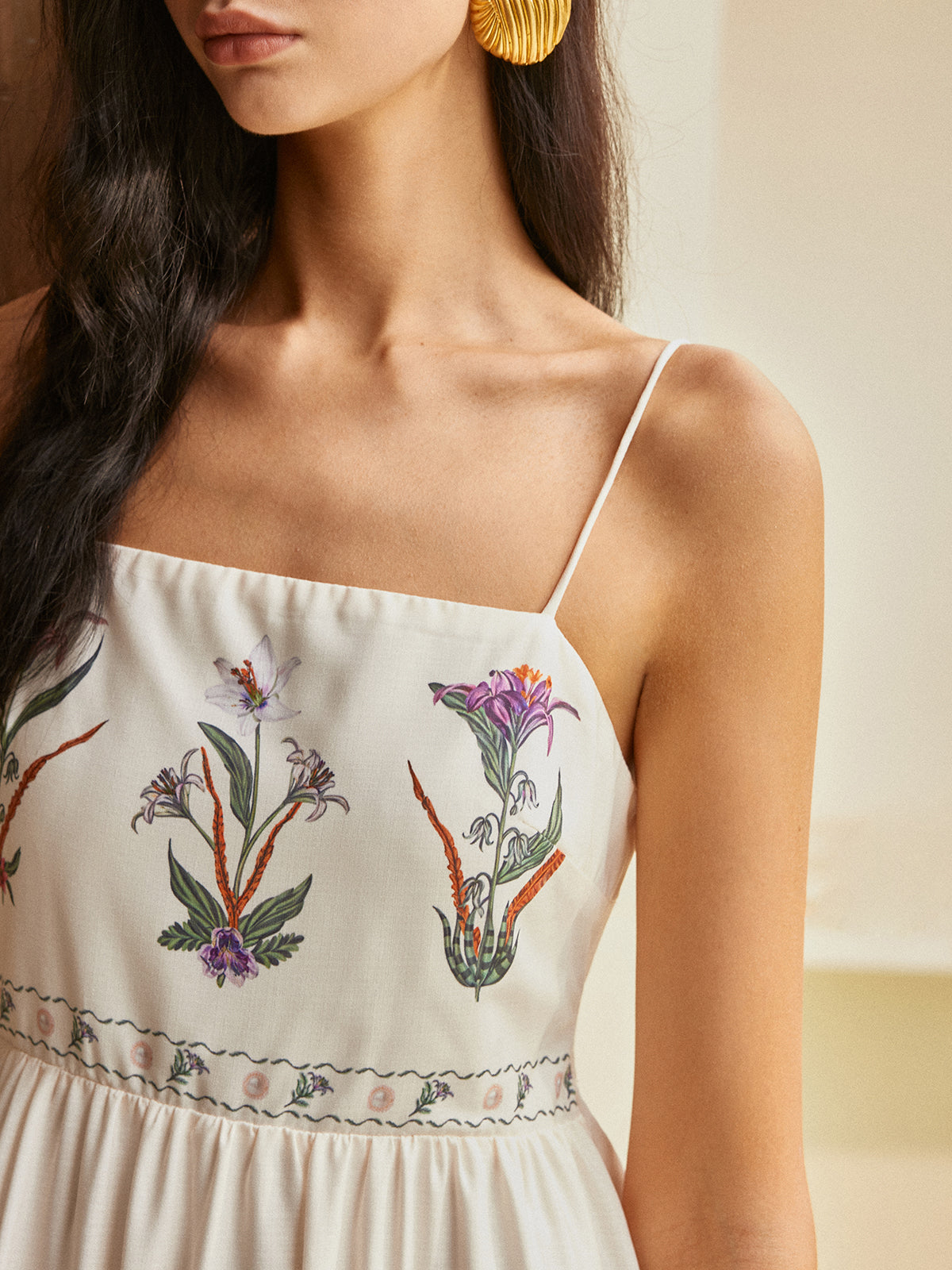 Robe à fleurs plissée dos nu