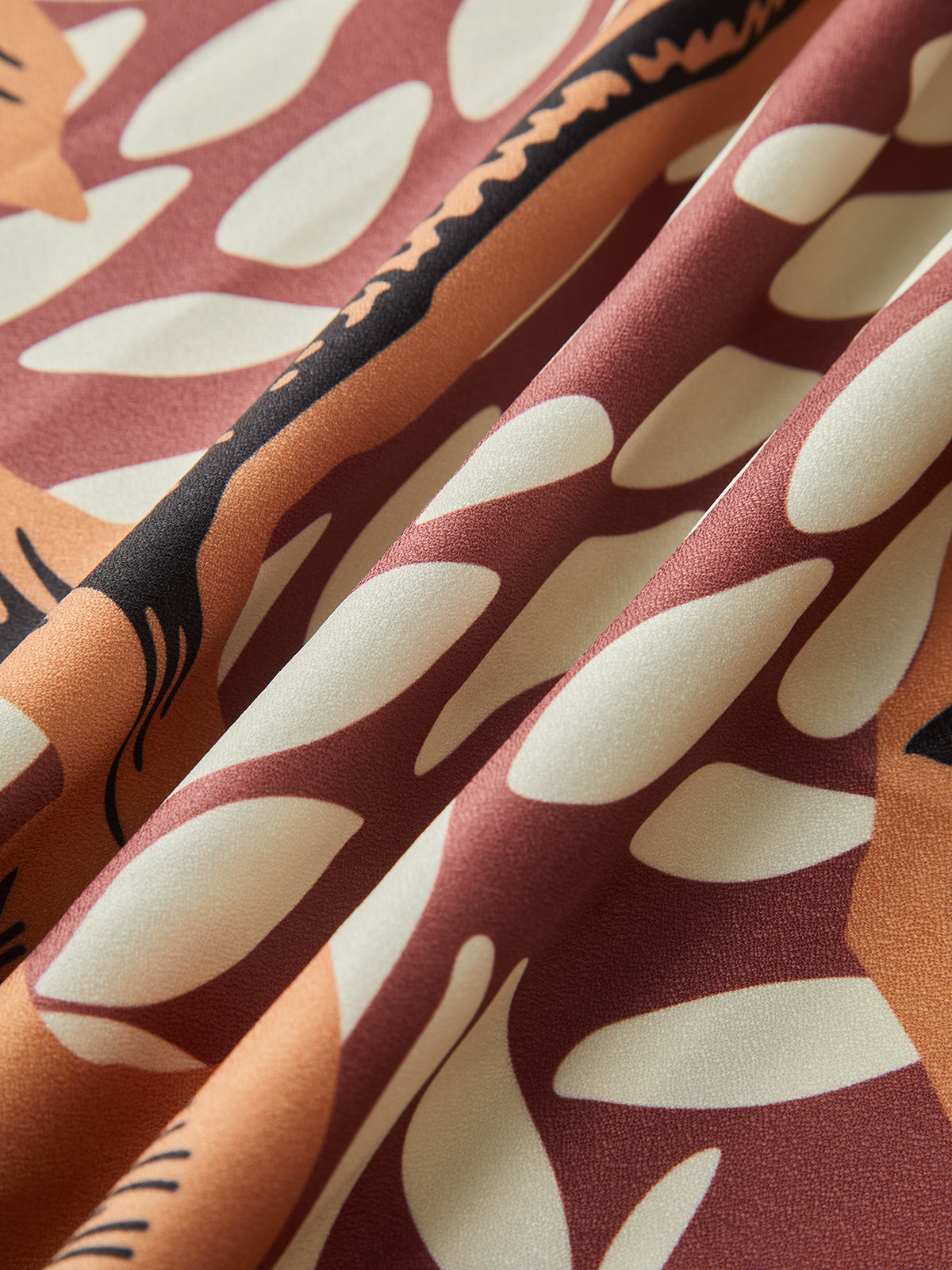 Strandkleid mit Blumenmuster und Knoten