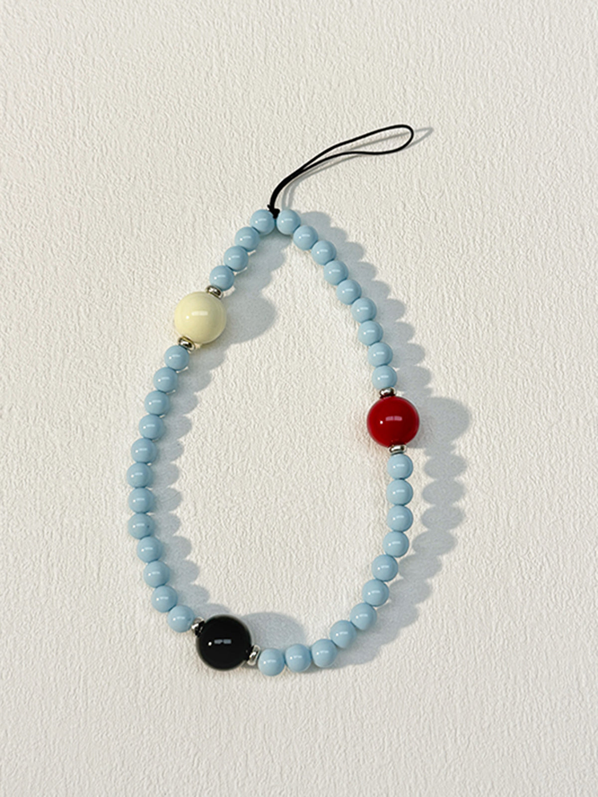 Elegantes Handy-Lanyard mit Perlen