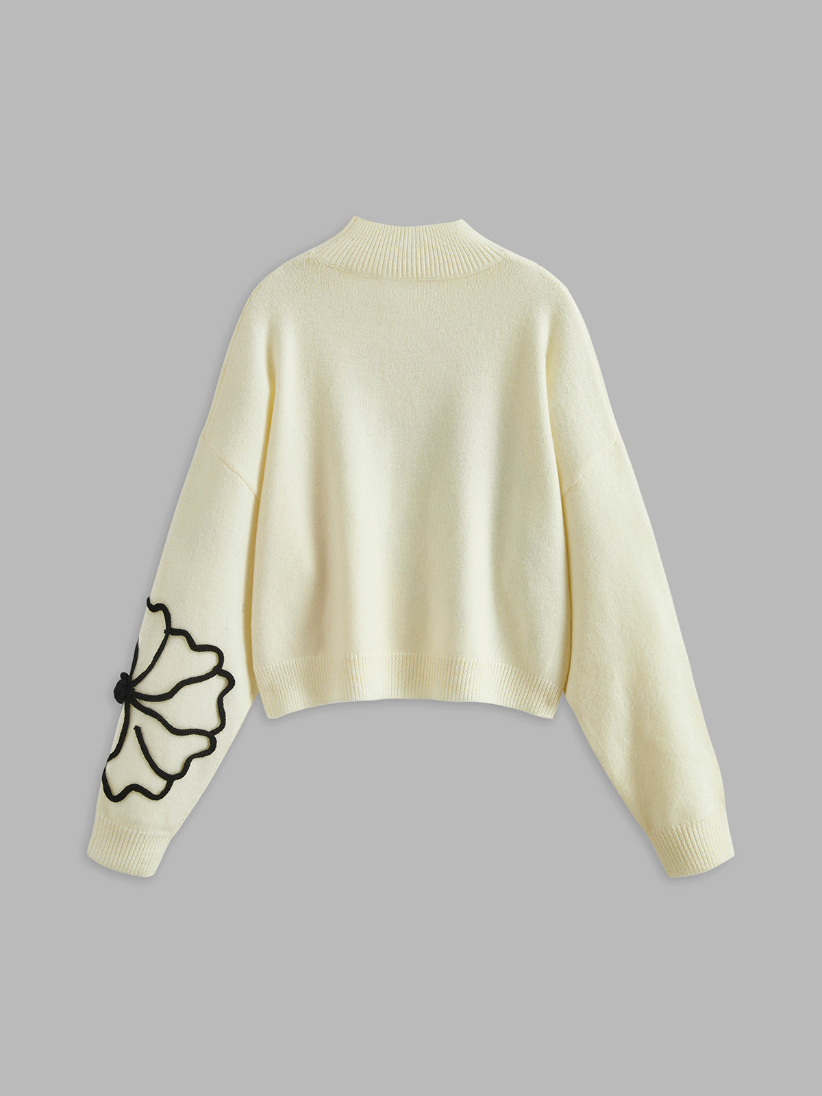 Haut en maille brodé de fleurs