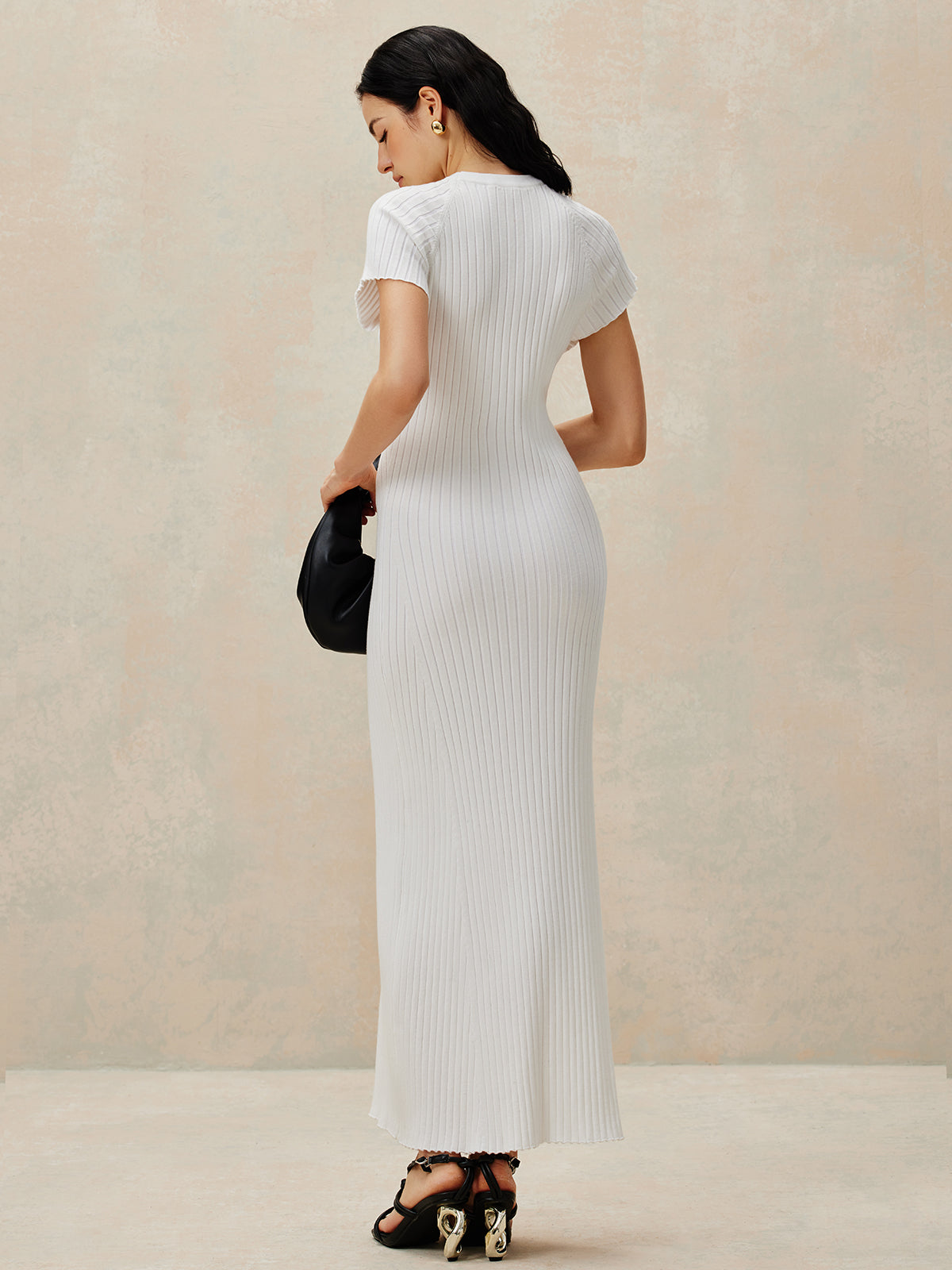 Robe pull à décoration métallique