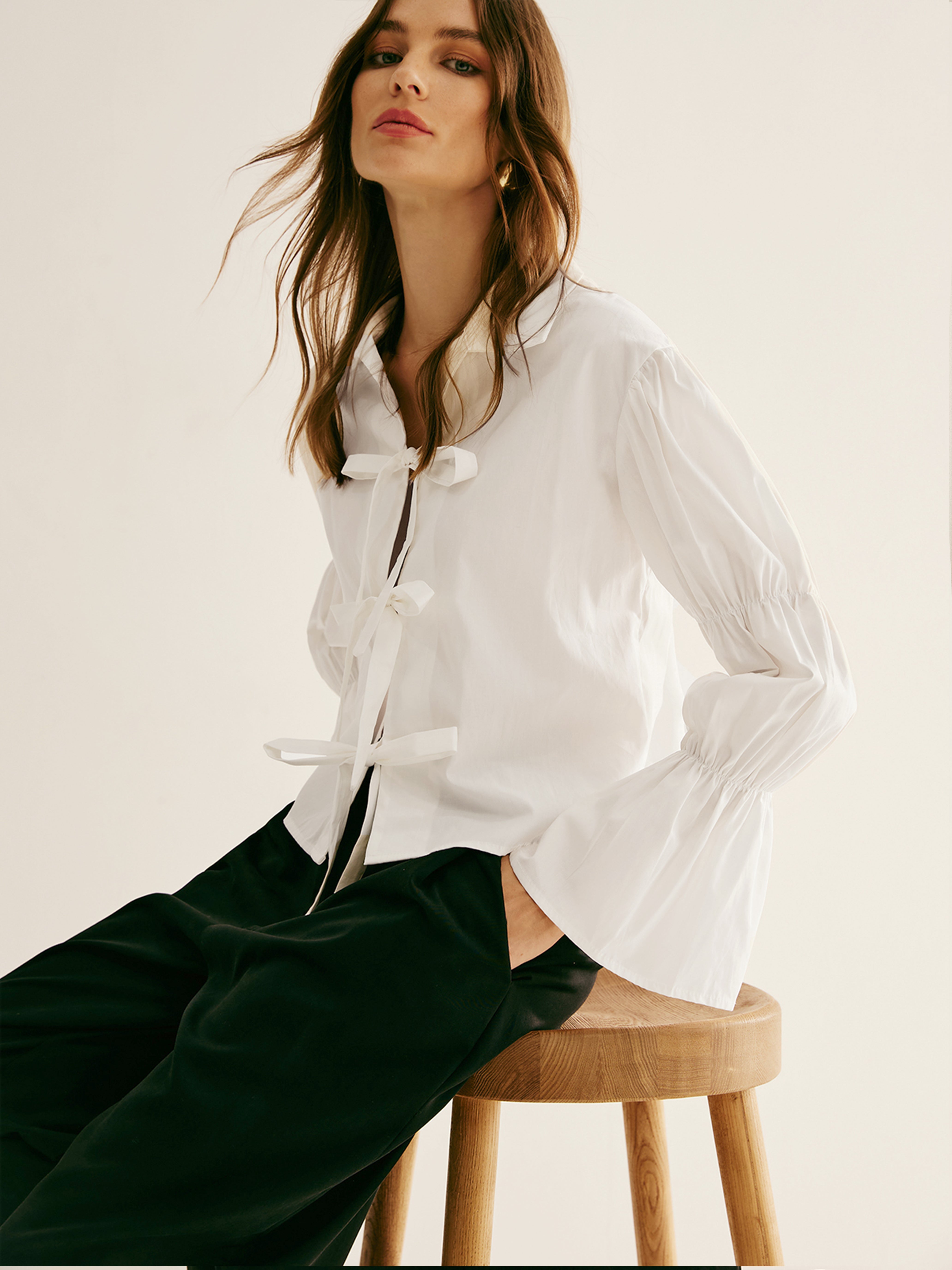 Polo plissé à nouer sur le devant