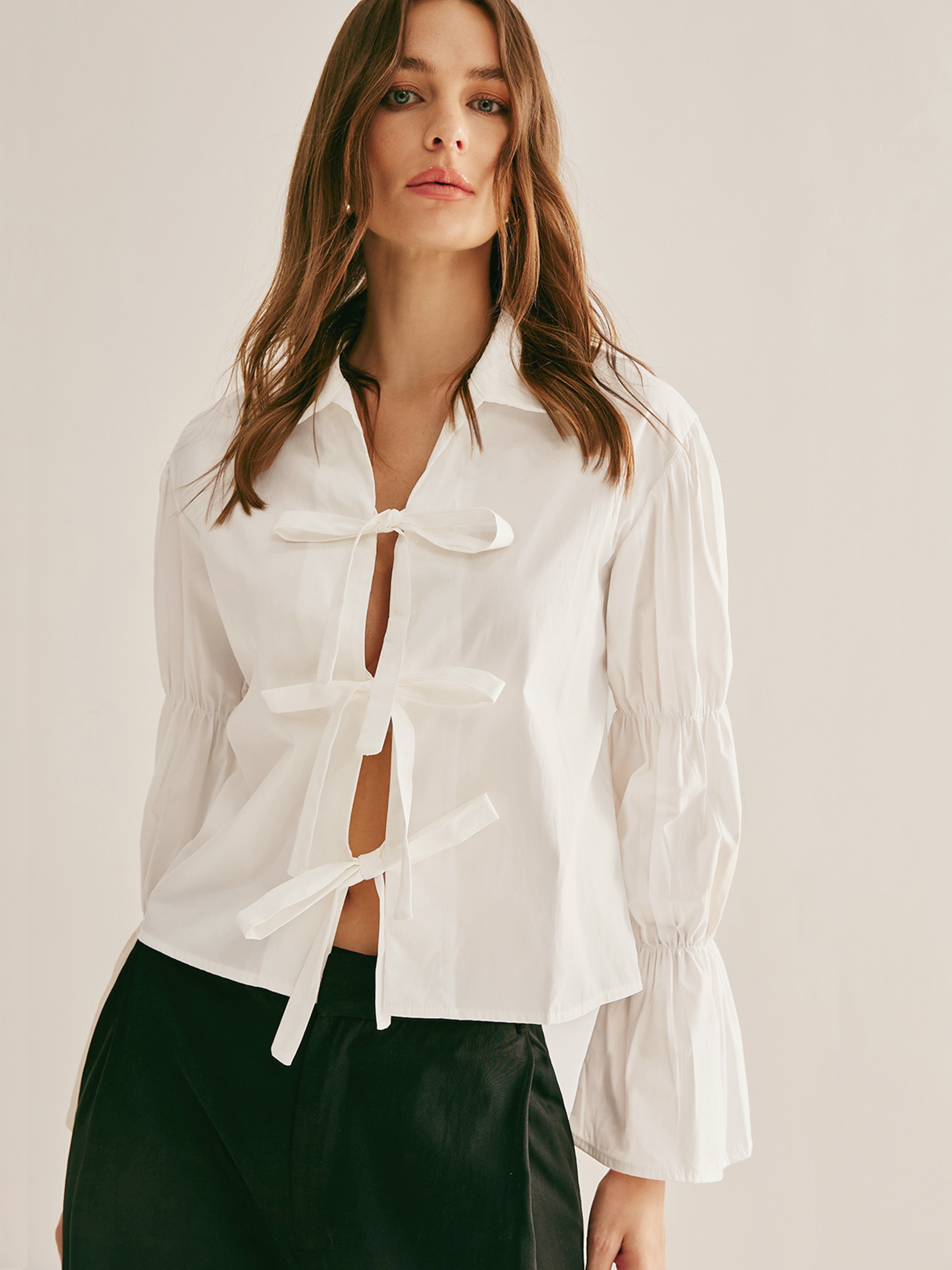 Polo plissé à nouer sur le devant