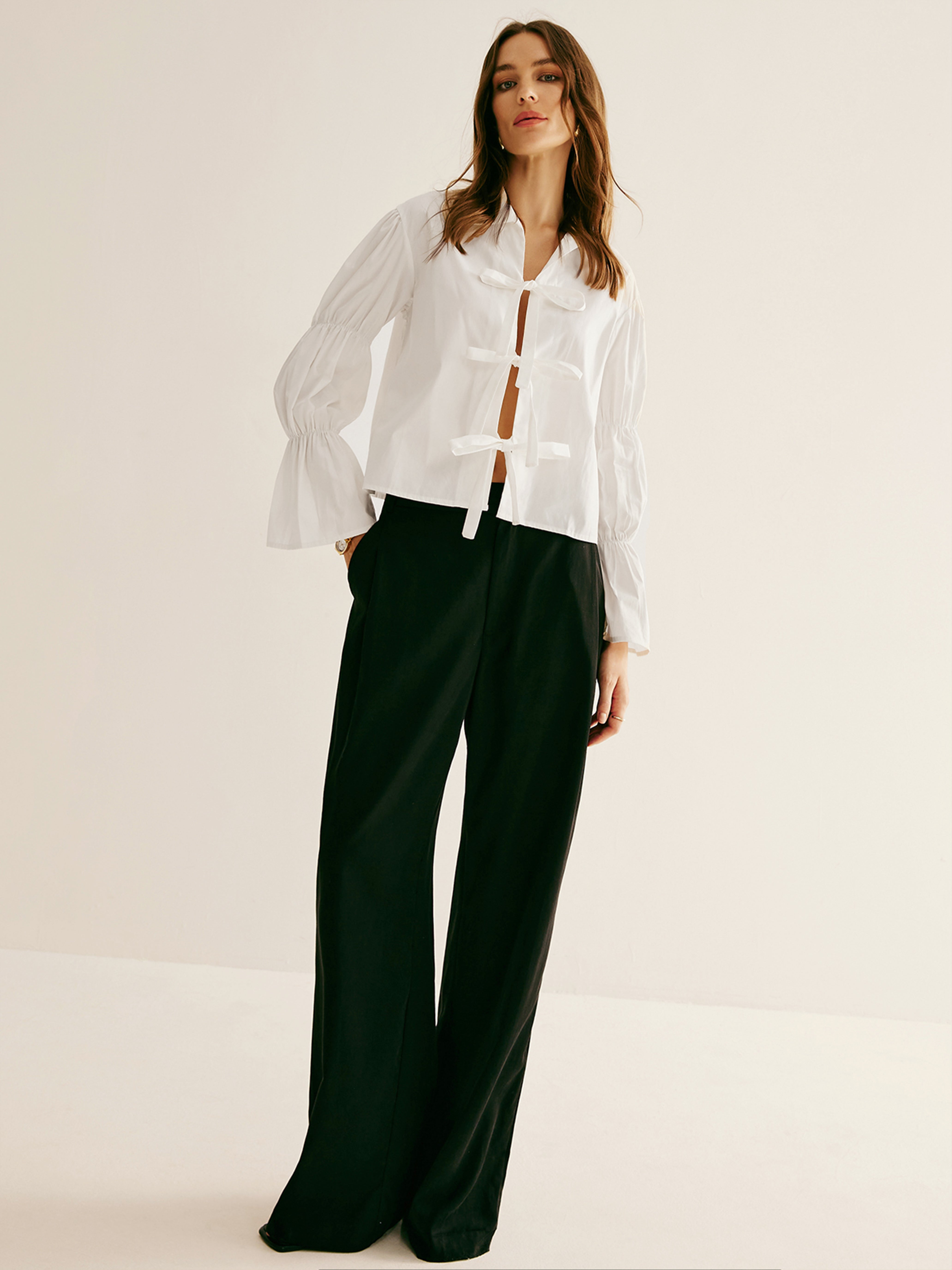 Polo plissé à nouer sur le devant