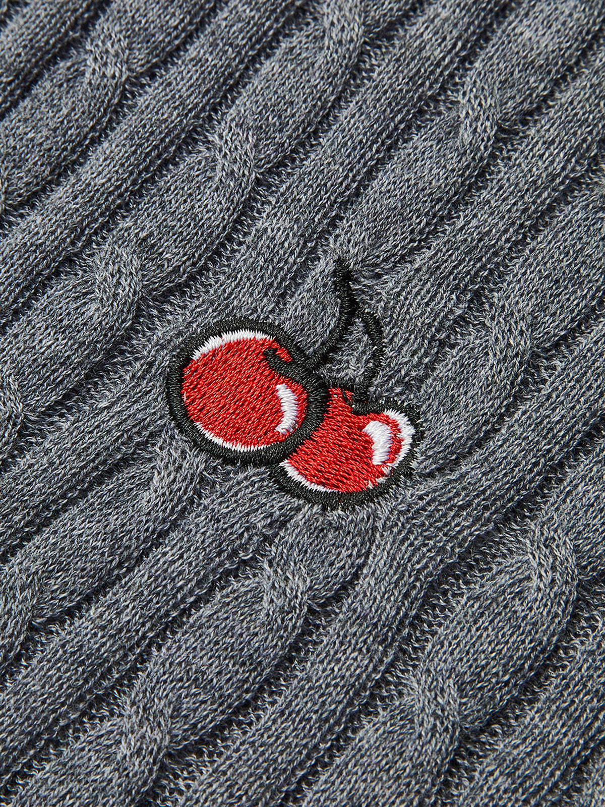 Gilet en maille torsadée jacquard