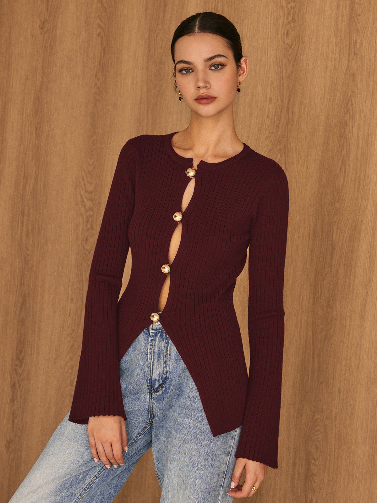 Haut en maille fendue à boutons dorés