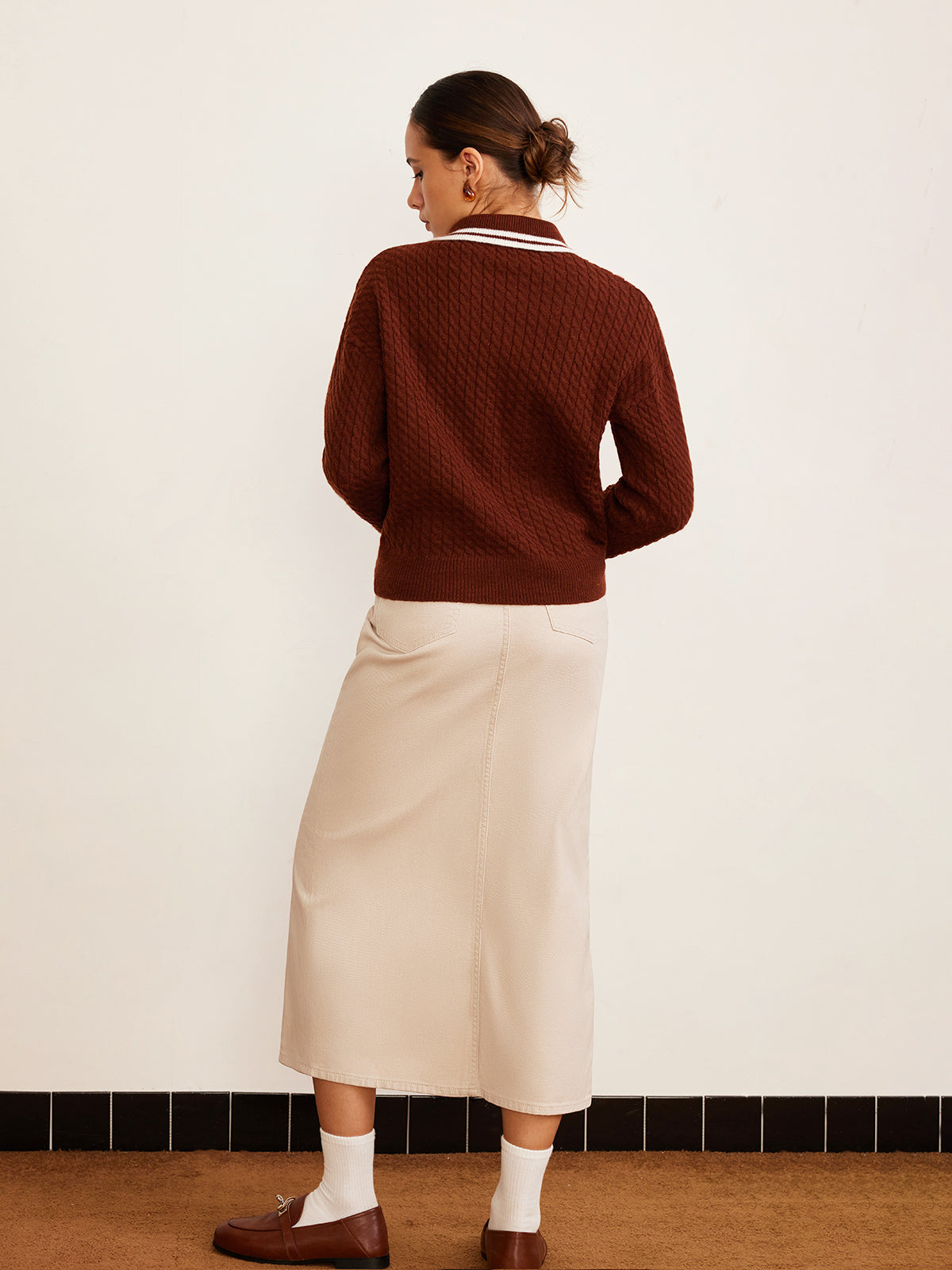 Pull polo à boutons en maille torsadée