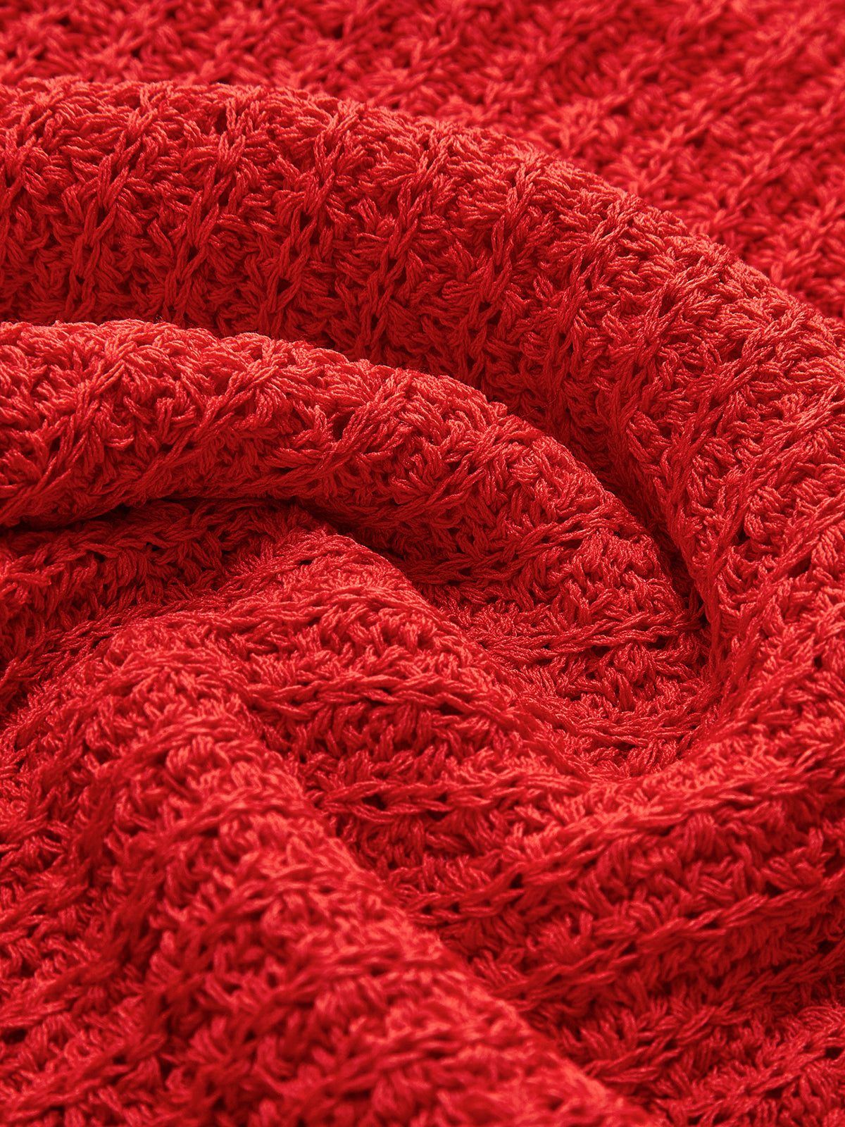 Gilet sans manches à bordure ondulée