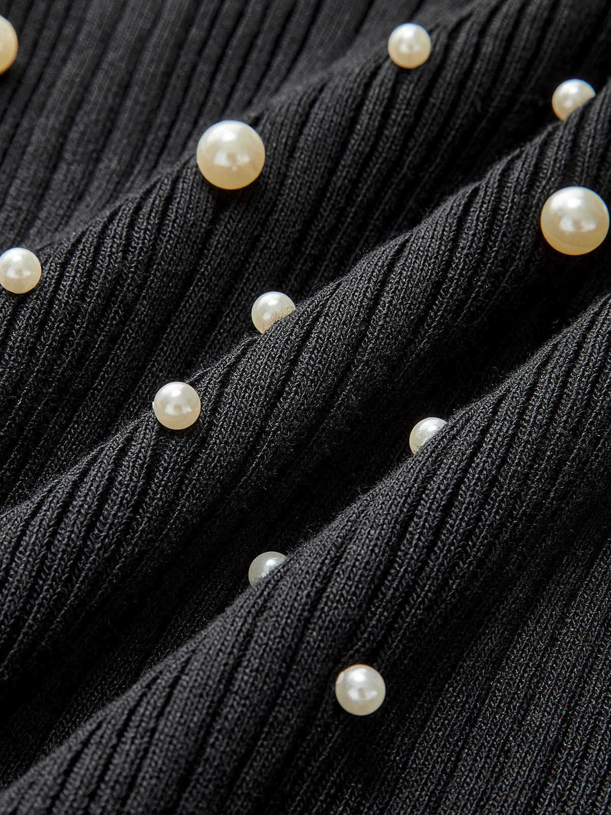 Gilet extensible à perles