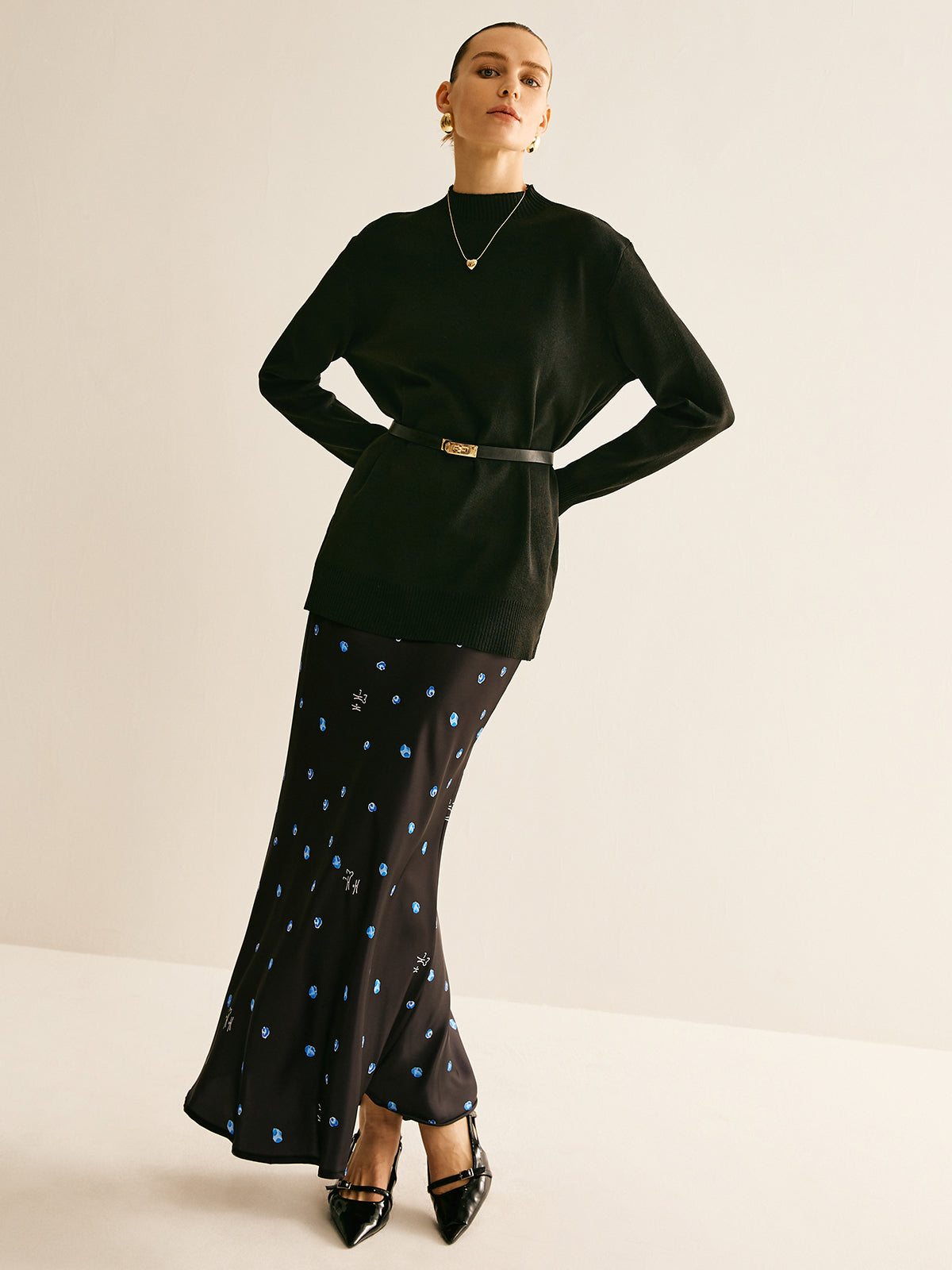 Pull uni à col montant et ceinture polyvalent