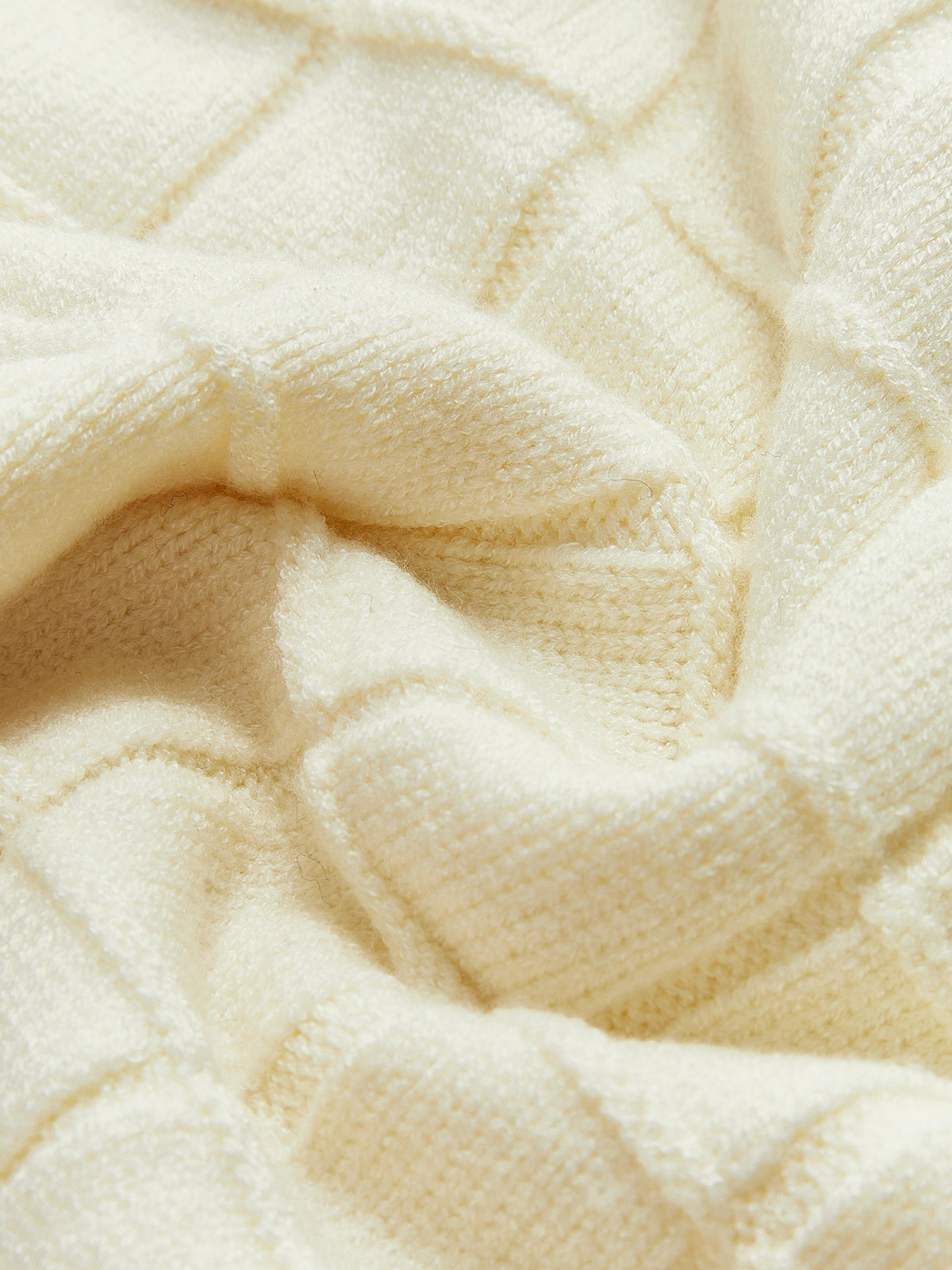 Pull à carreaux avec bordure contrastée