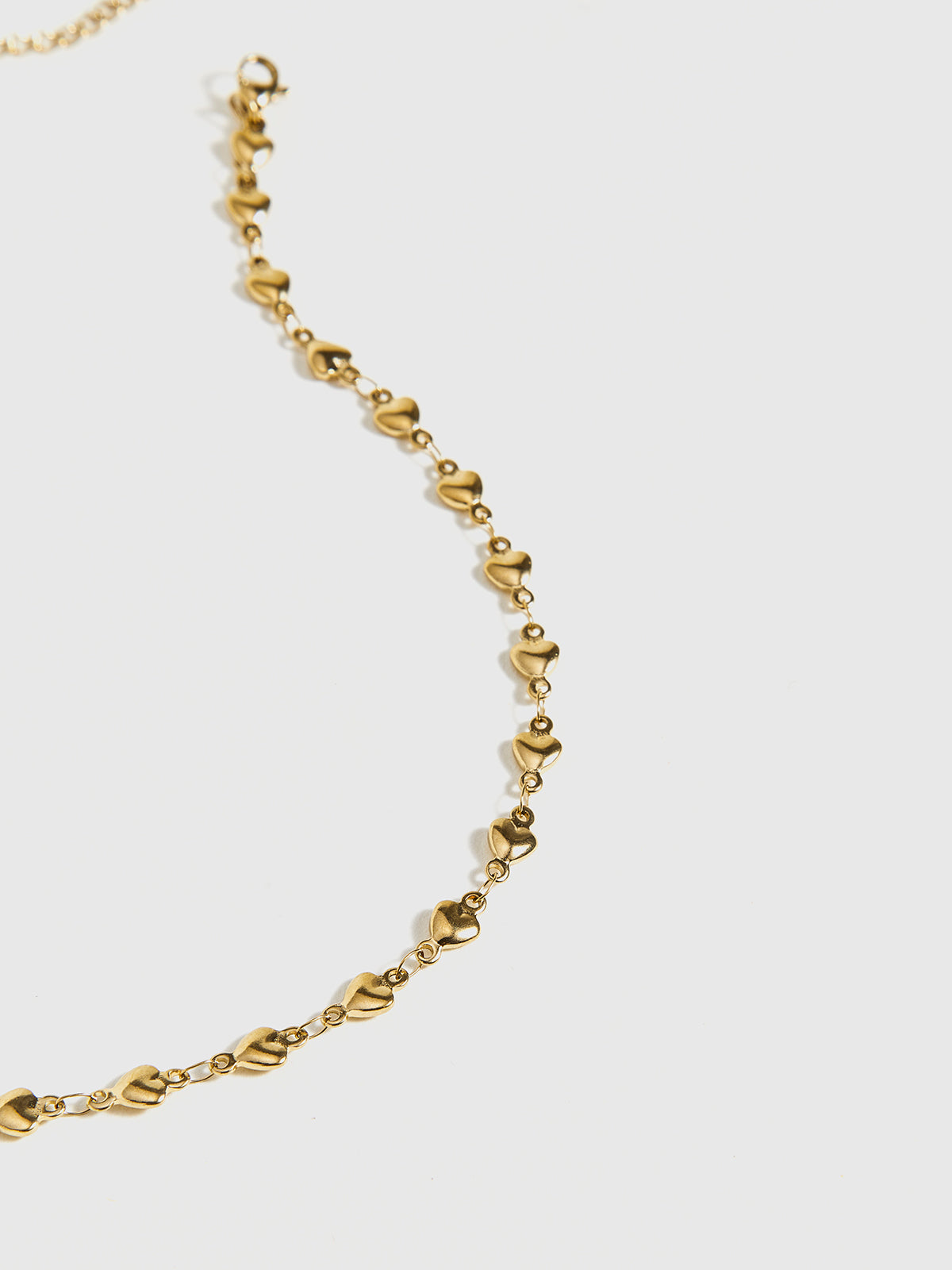 Collier à pompon en forme de cœur