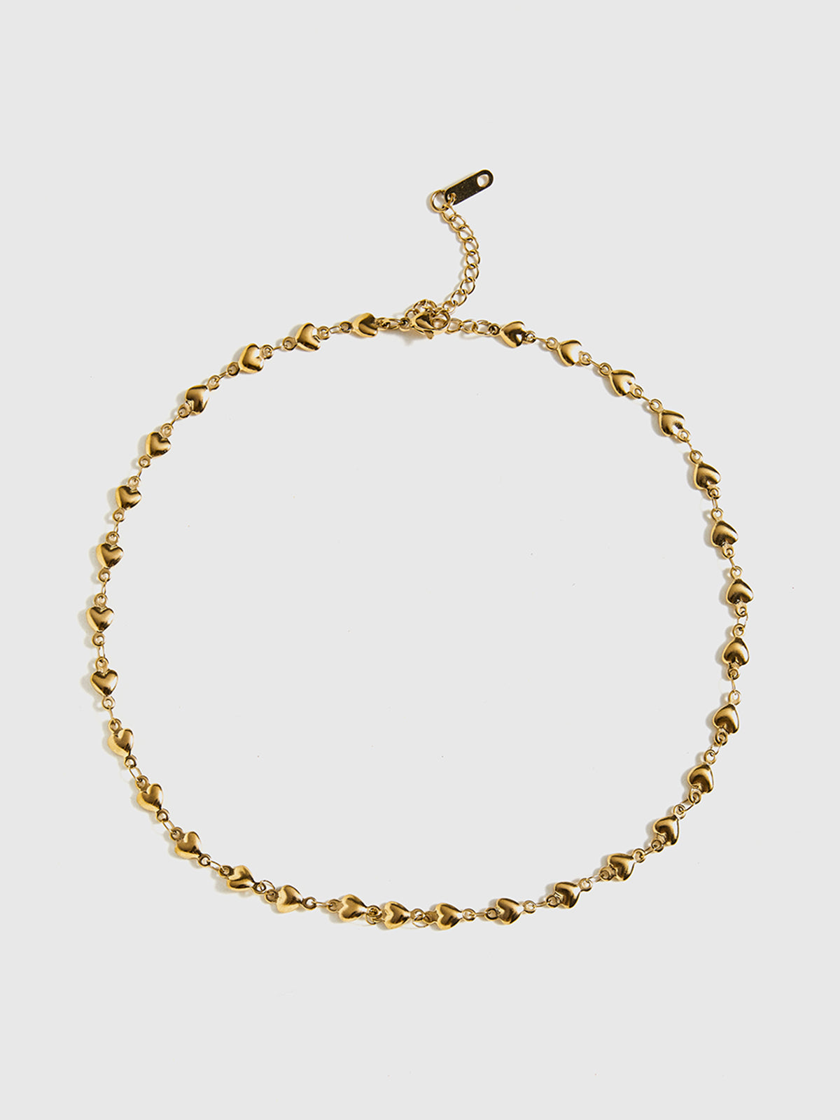 Collier à pompon en forme de cœur