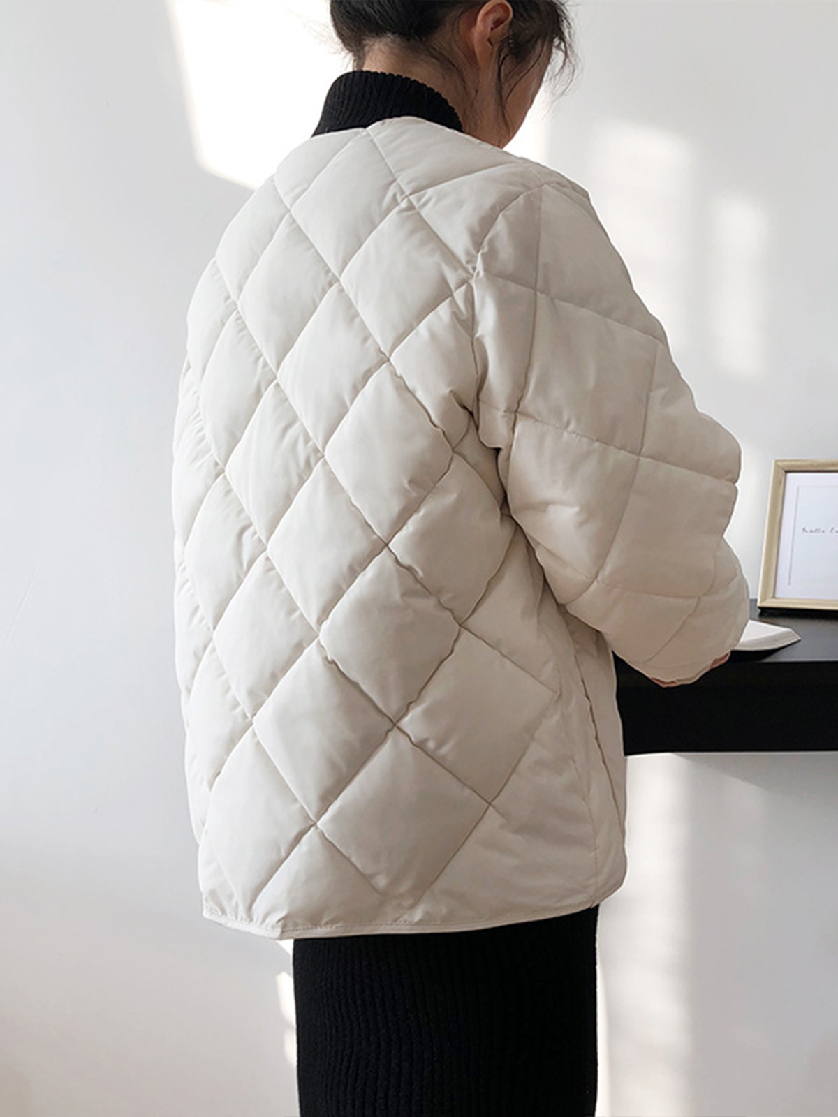 Manteau d'hiver à boutons losanges