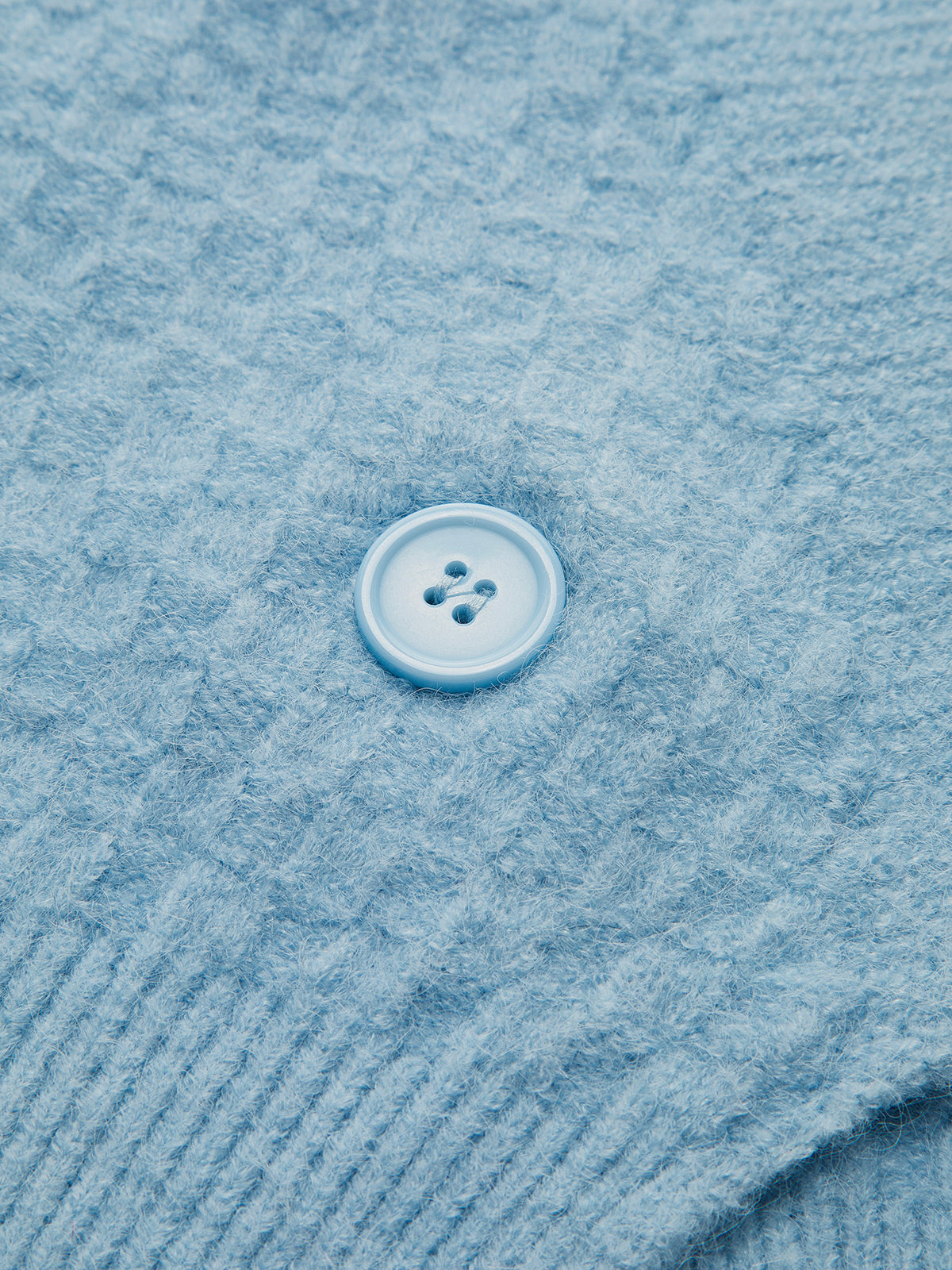 Gilet sans manches à bretelles croisées orné de perles