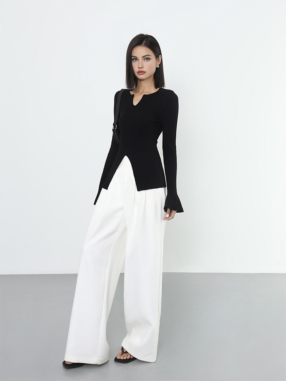 Haut en maille côtelée fendue à volants