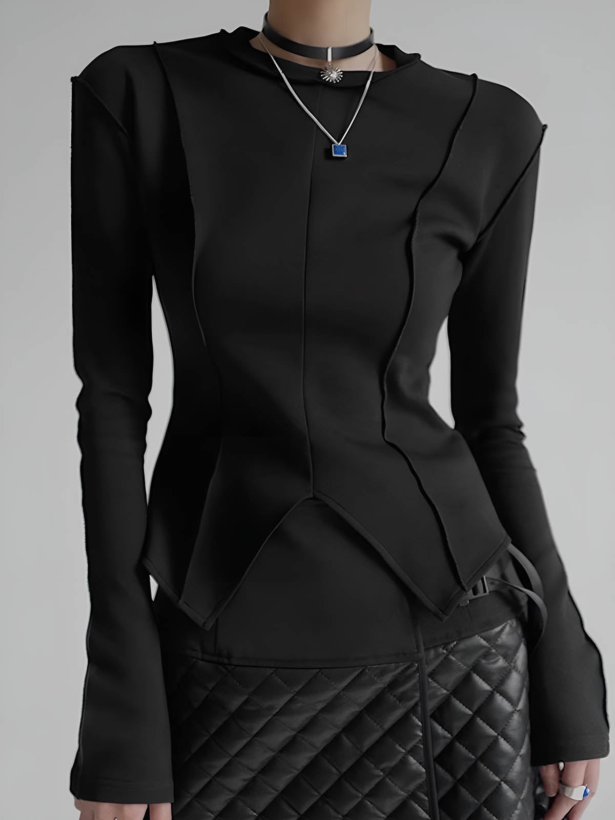 Blouse slim en jersey à passepoil