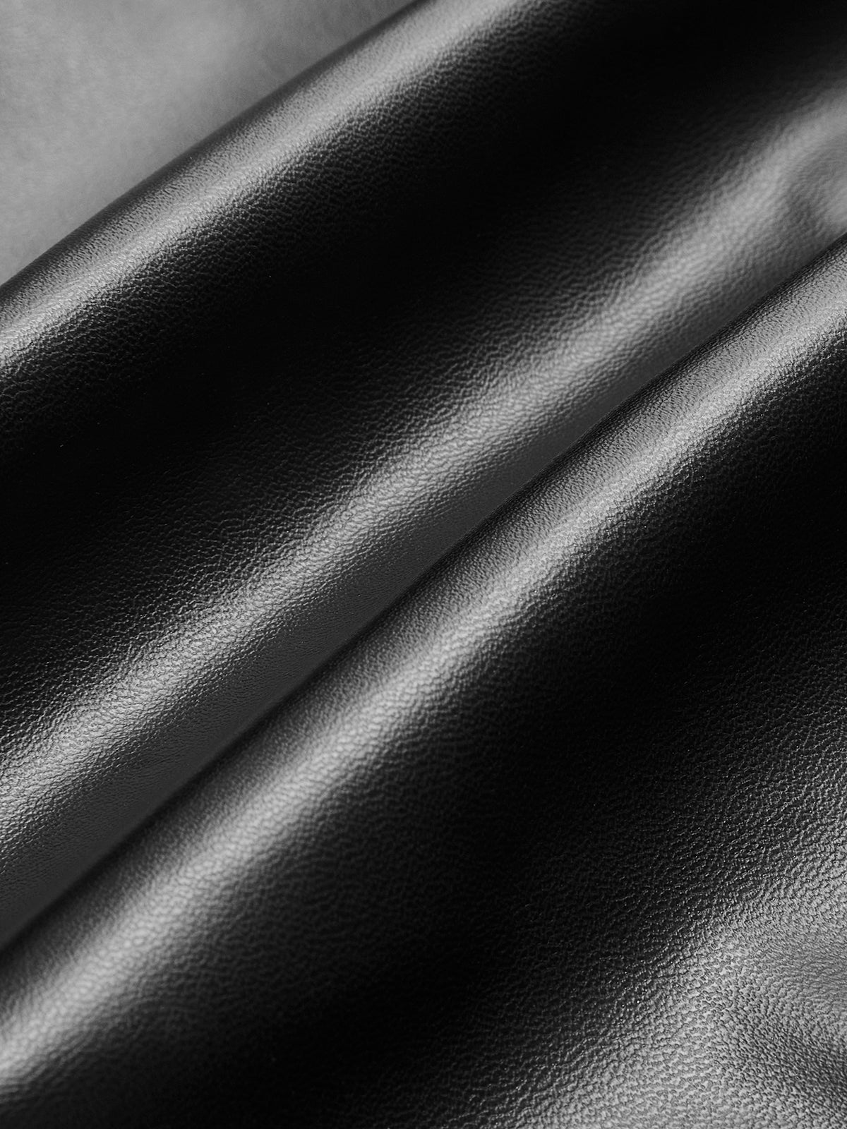 Jupe en cuir PU à boutons et volants