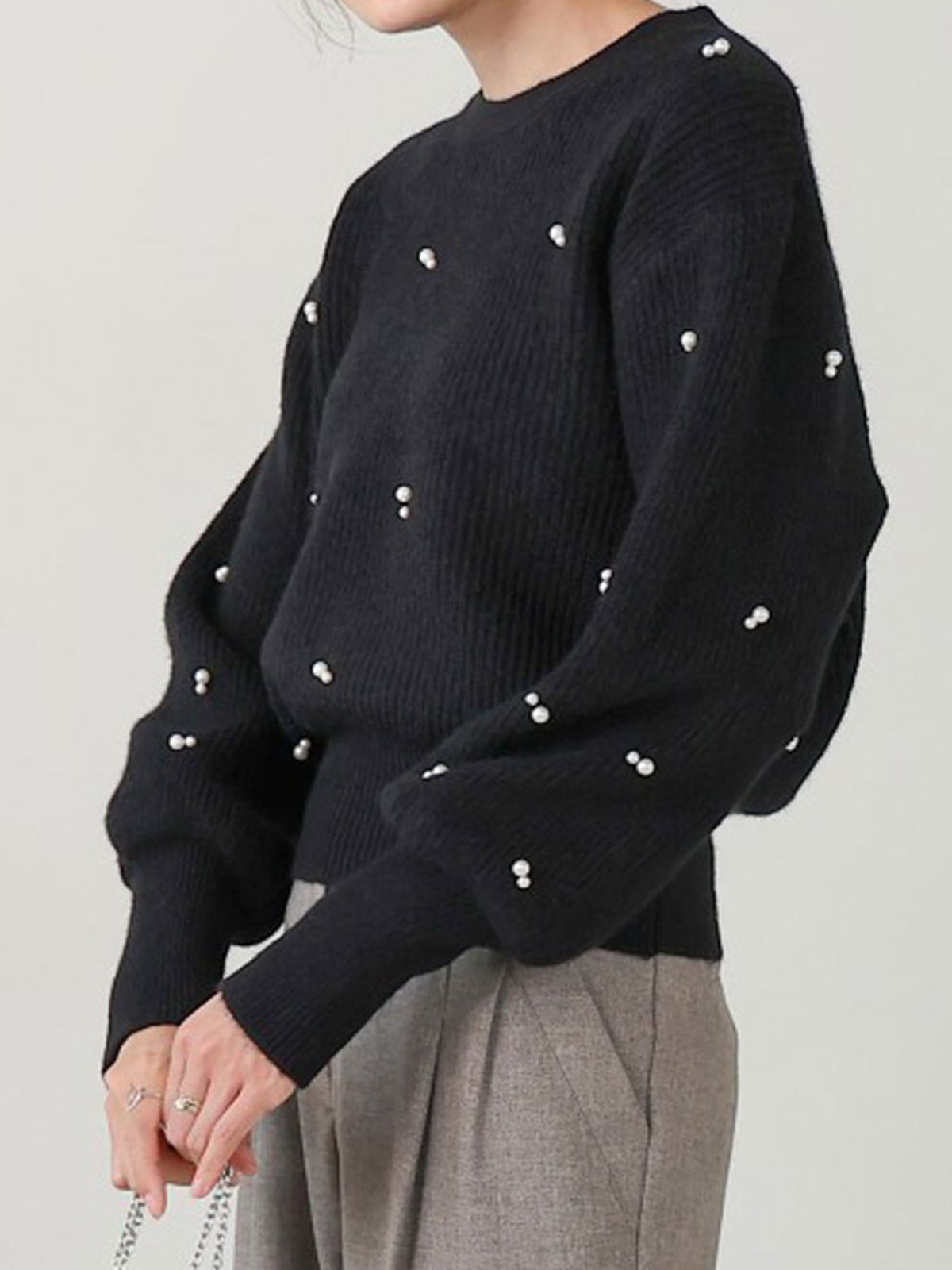 Pull à perles et à ceinture