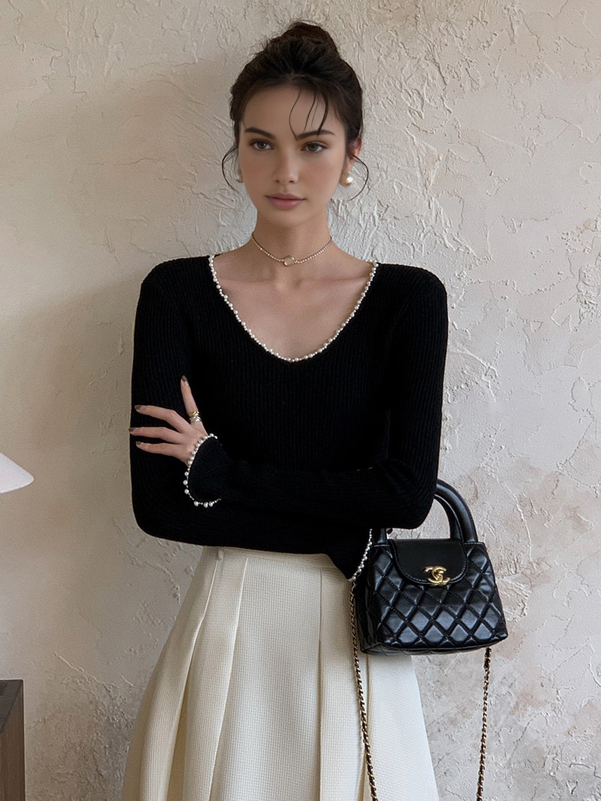 Haut en maille à col en V et bordure perlée