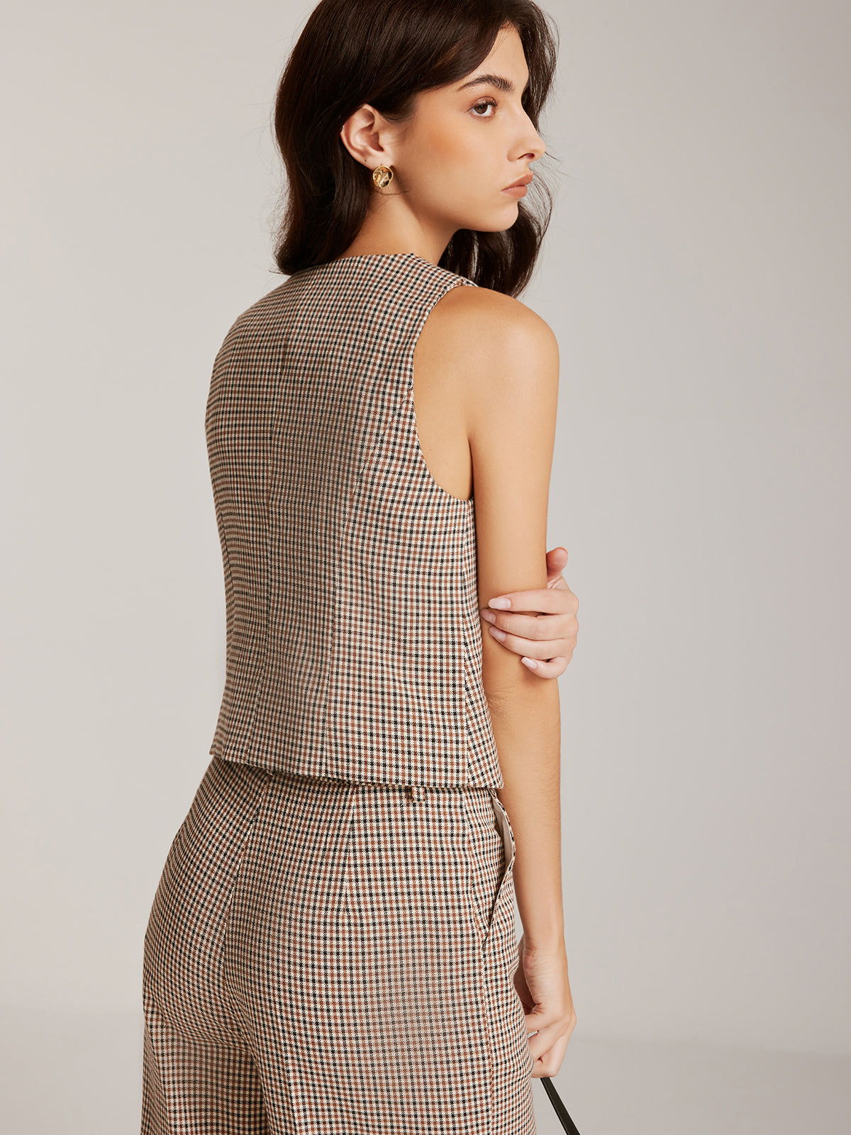 Gilet élégant à carreaux boutonné