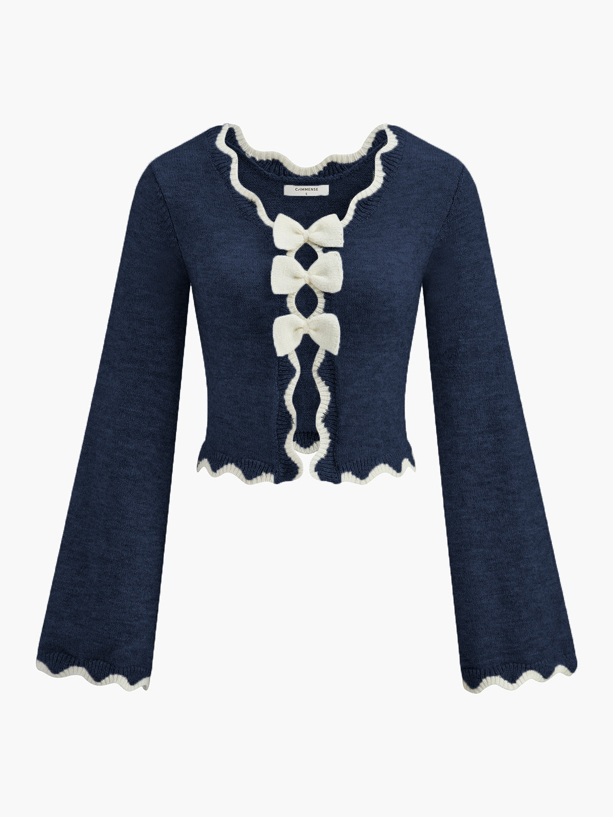 Pull à nœud et bordure ondulée contrastée