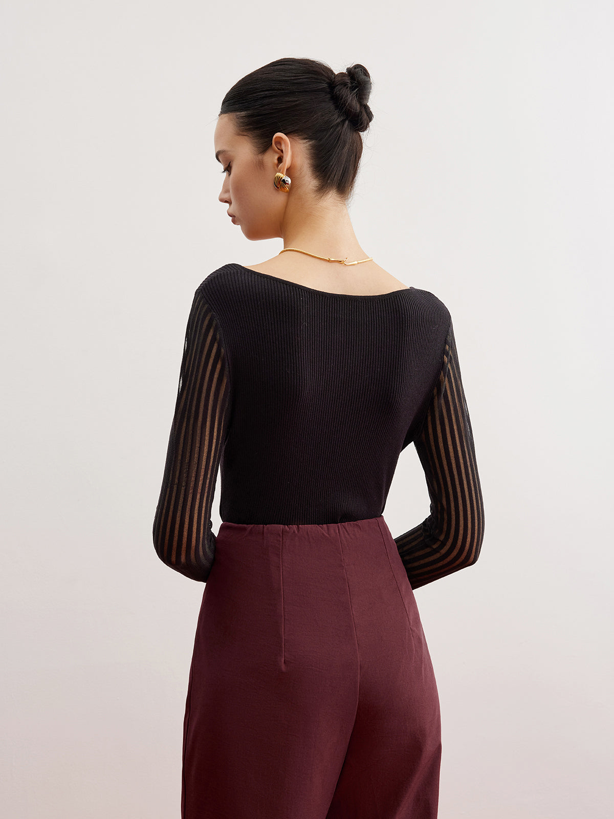 Pull côtelé à manches transparentes