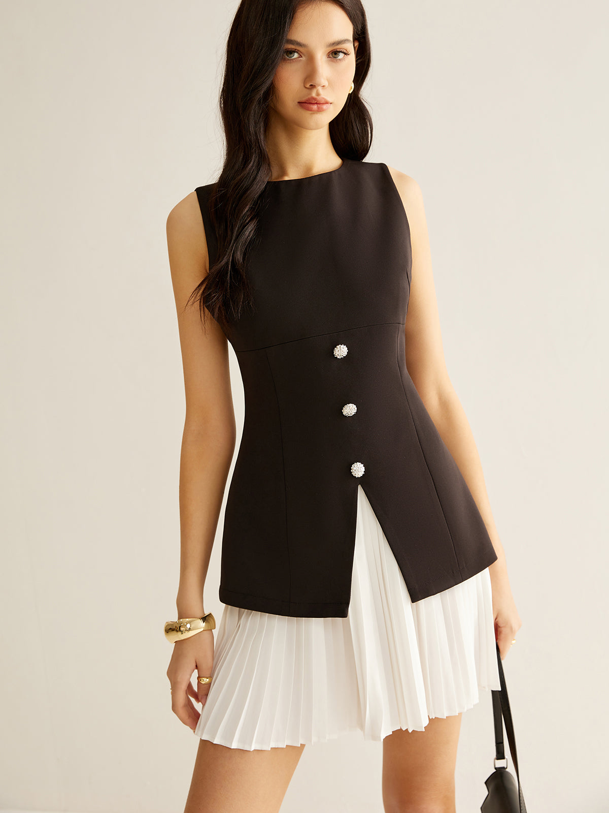 Robe plissée bicolore avec empiècements
