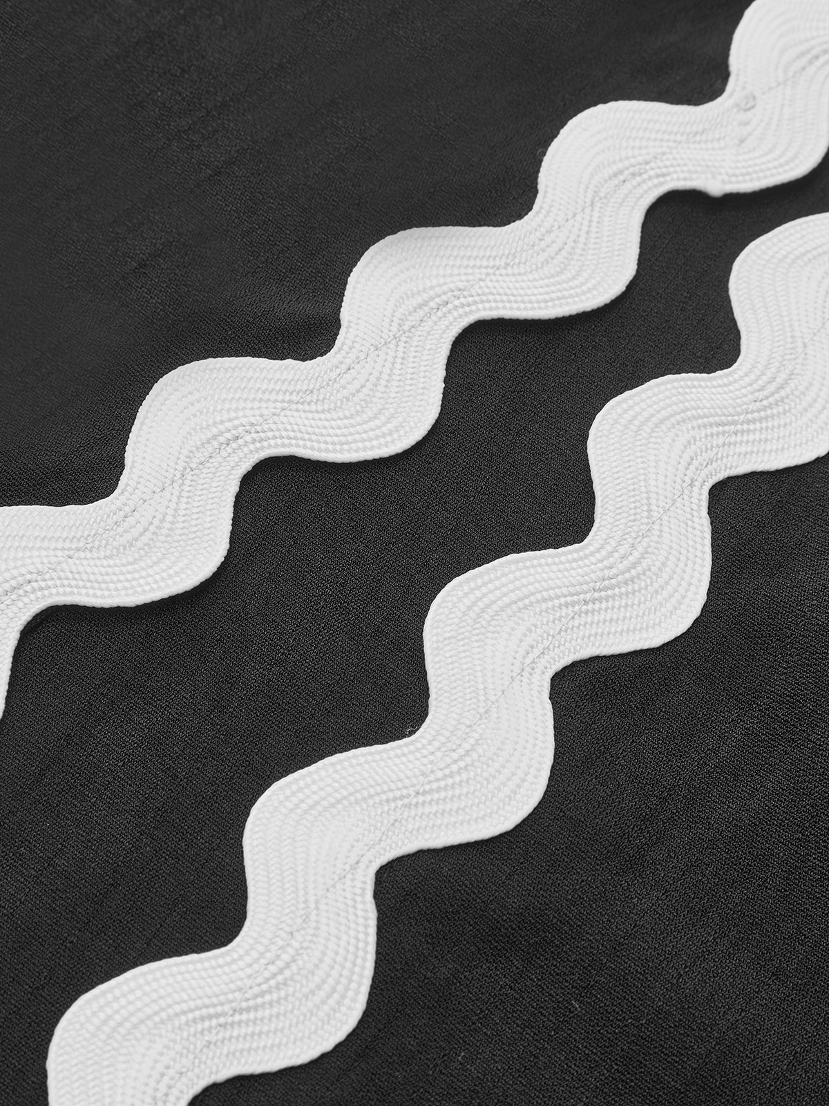 Robe midi dos nu à bordure en zigzag