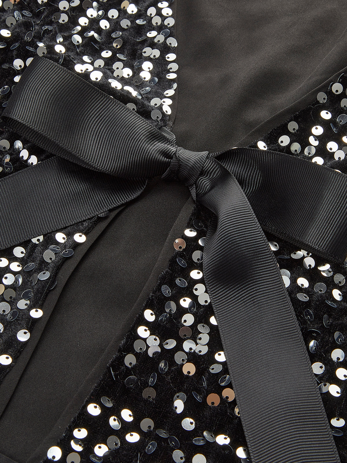 Chemisier à col V et nœud à sequins