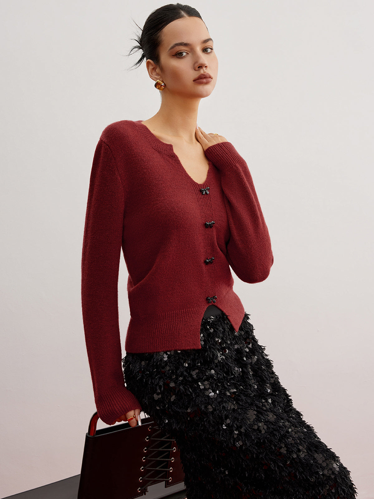 Pullover mit Schleifendetail und Schlitz