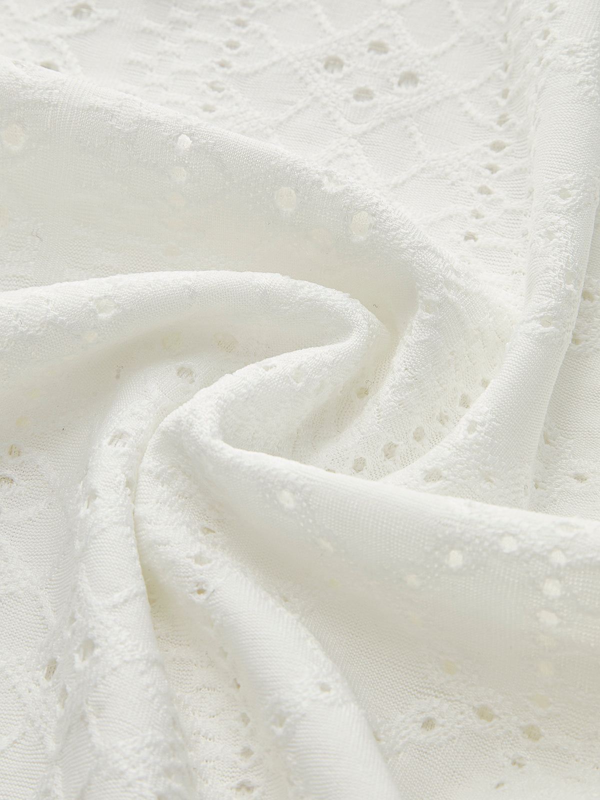 Haut moulant semi-transparent à col montant et plis latéraux