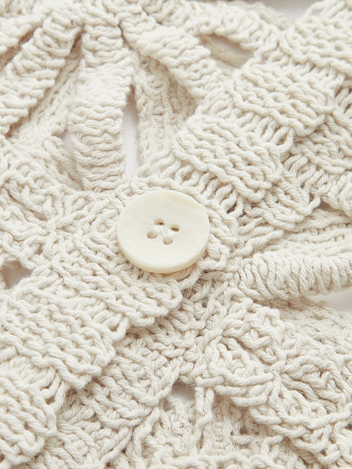 Cardigan boutonné à motif carré au crochet