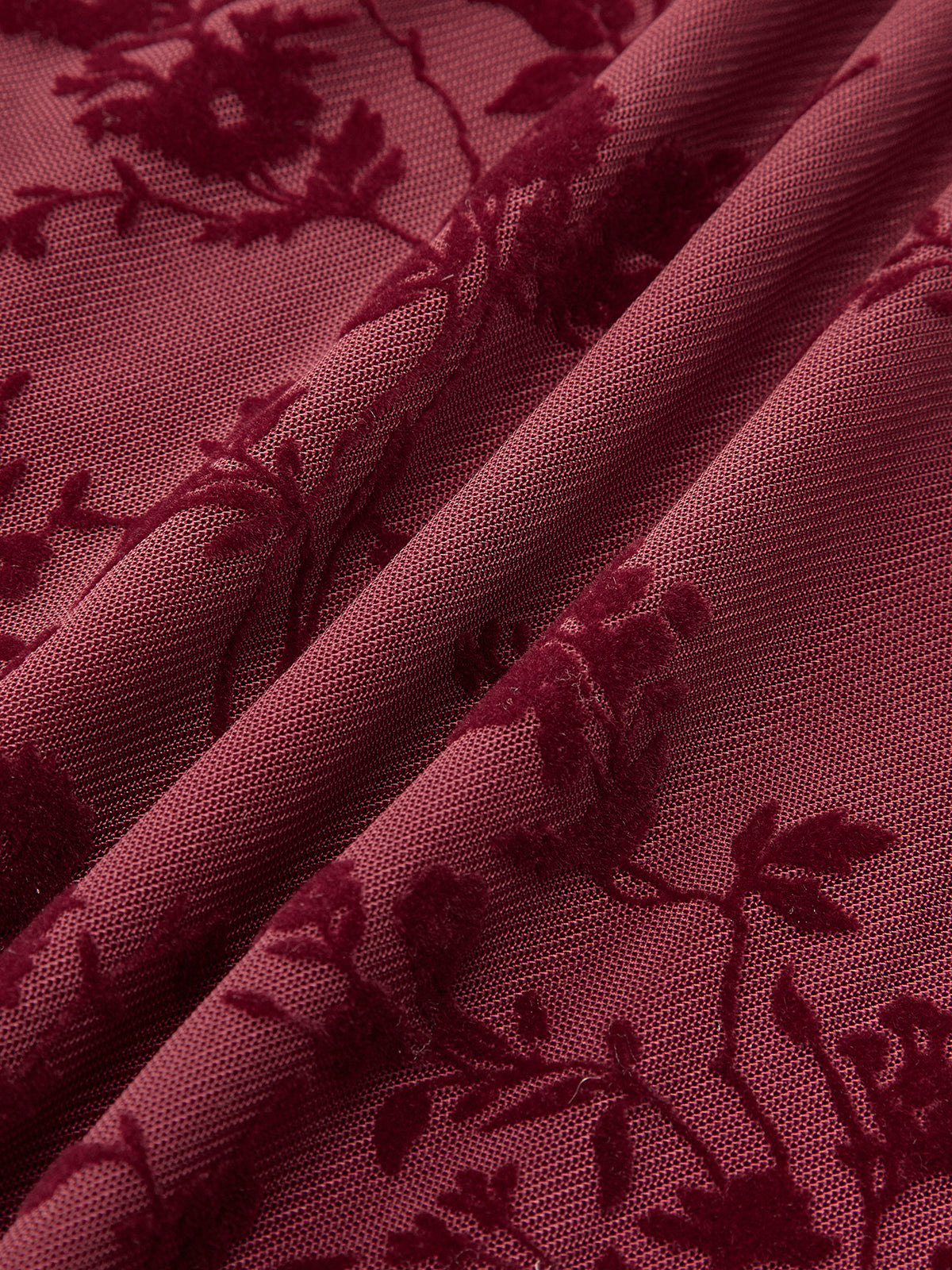 Geblümtes Kleid mit Rüschensaum und Bindedetail vorne