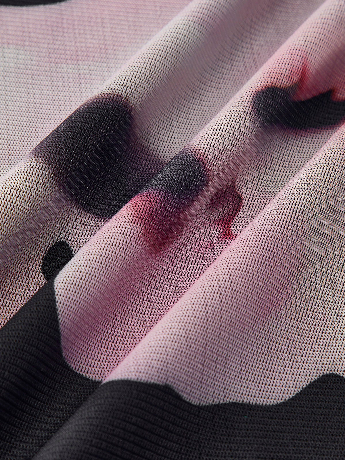 Robe asymétrique en maille fleurie