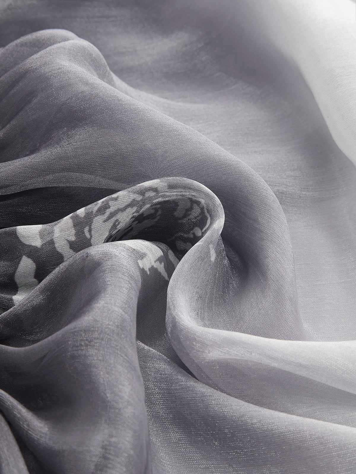 Haut en mousseline semi-transparente à dégradé floral et épaules dénudées