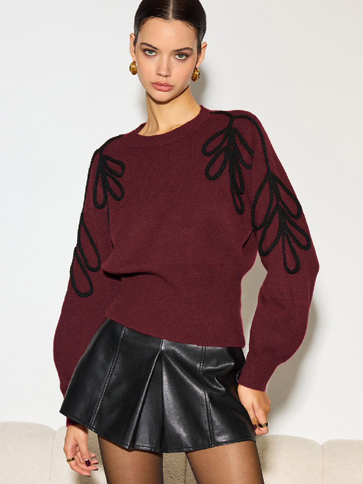 Haut en maille jacquard à taille cintrée