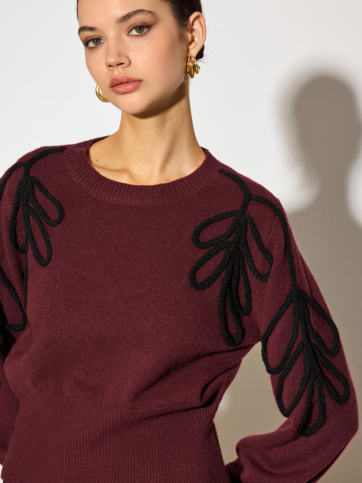 Haut en maille jacquard à taille cintrée