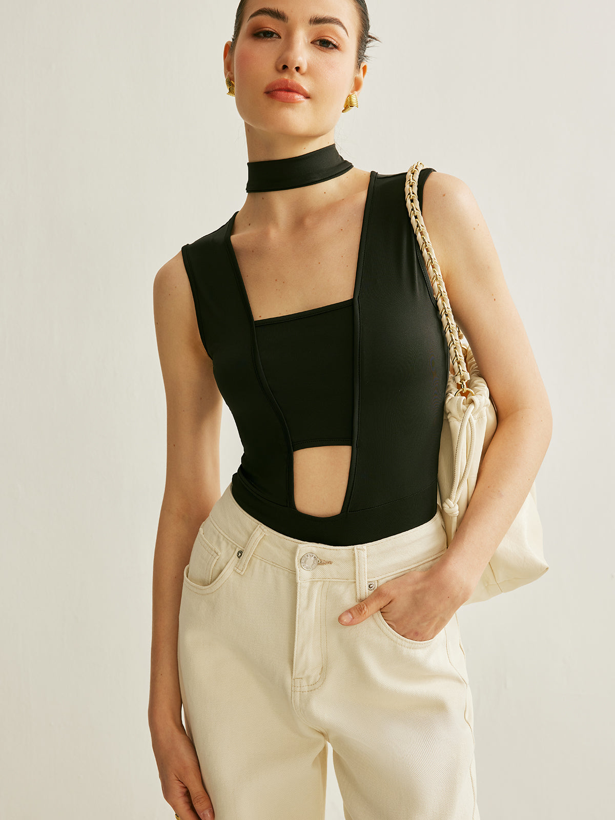Body athleisure sans manches à découpes