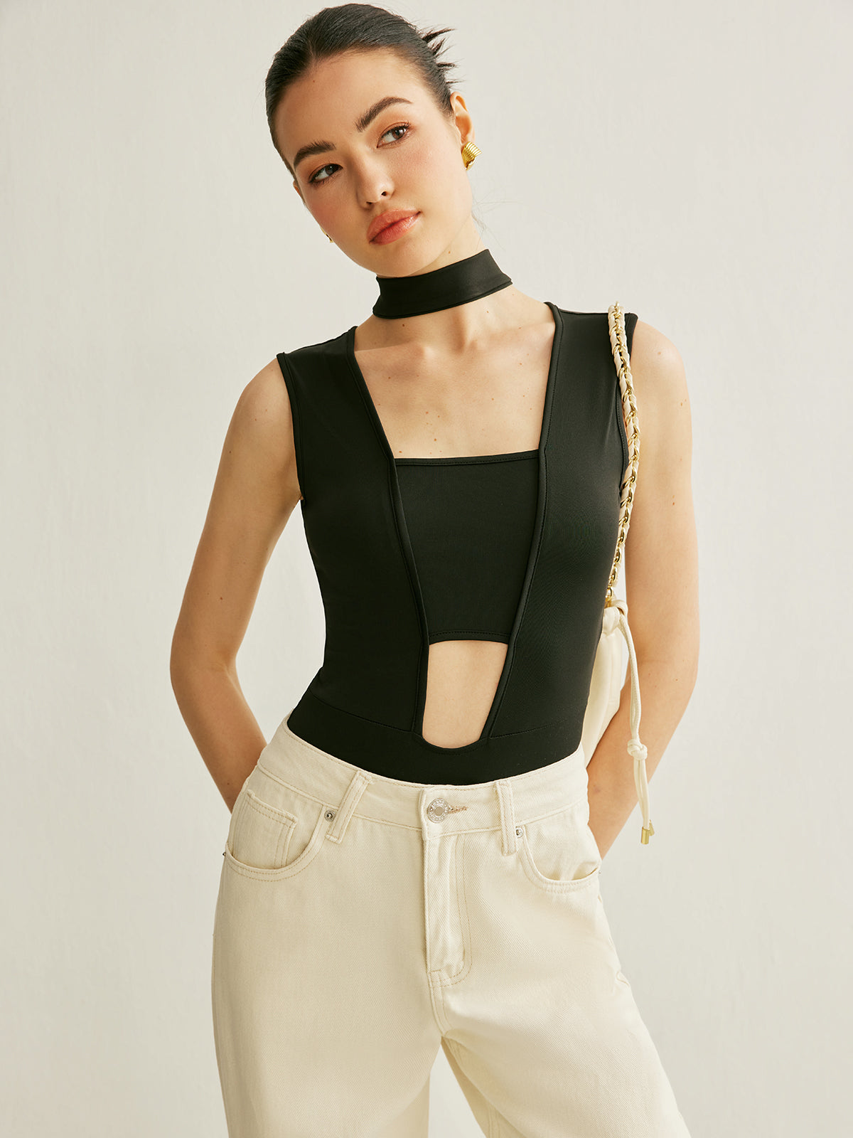 Body athleisure sans manches à découpes