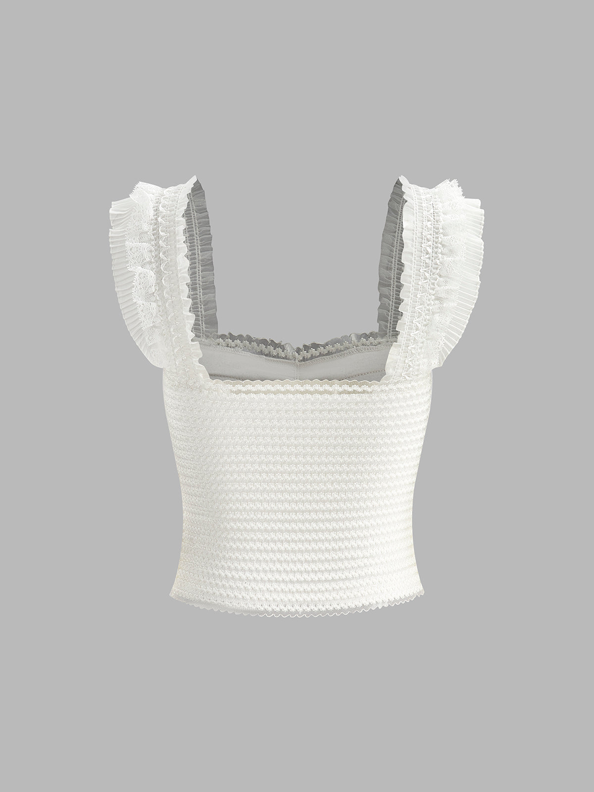 Haut à bretelles volantées et boutons smockés