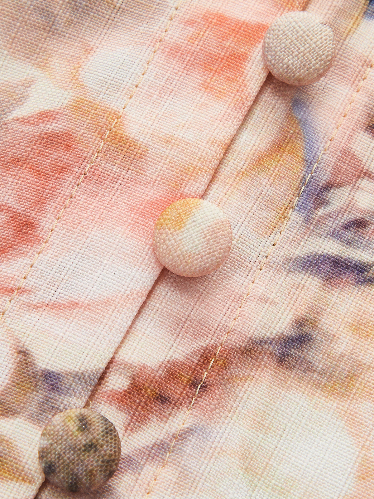 Robe fleurie à manches bouffantes et ceinture