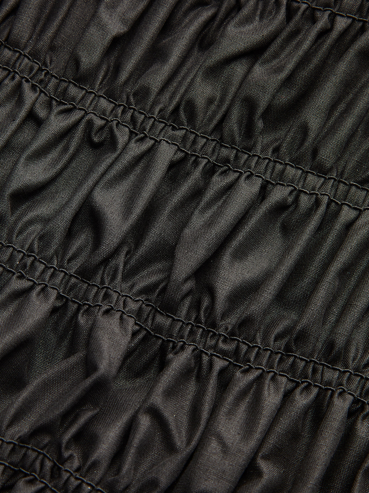 Robe à bretelles froncées