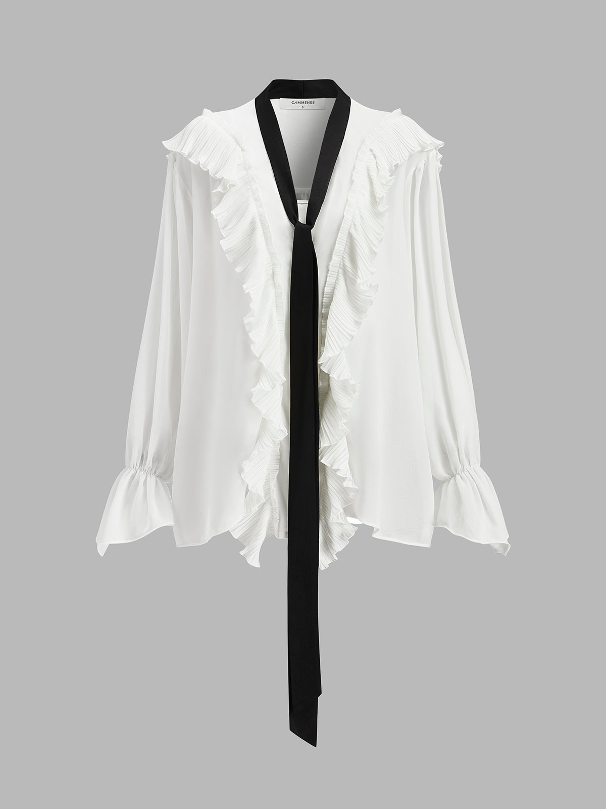 Blouse semi-transparente à volants avec cravate contrastée
