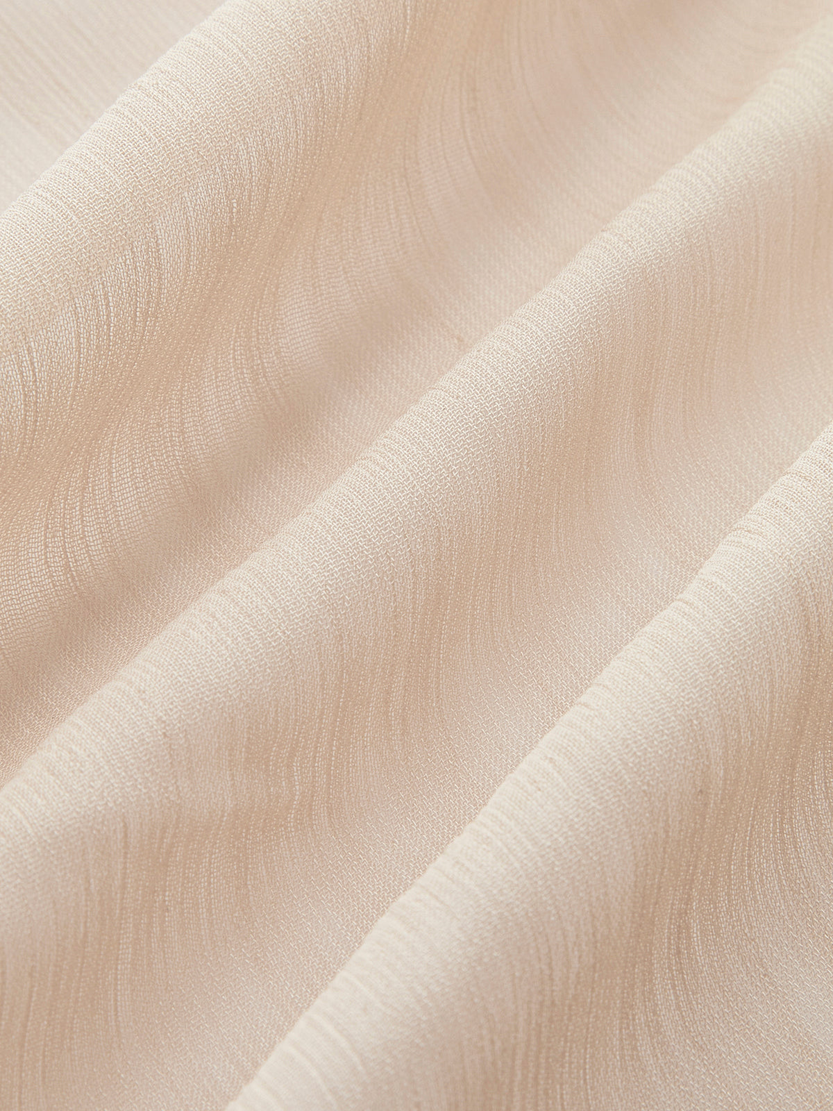 Haut dos nu à volants en mousseline semi-transparente