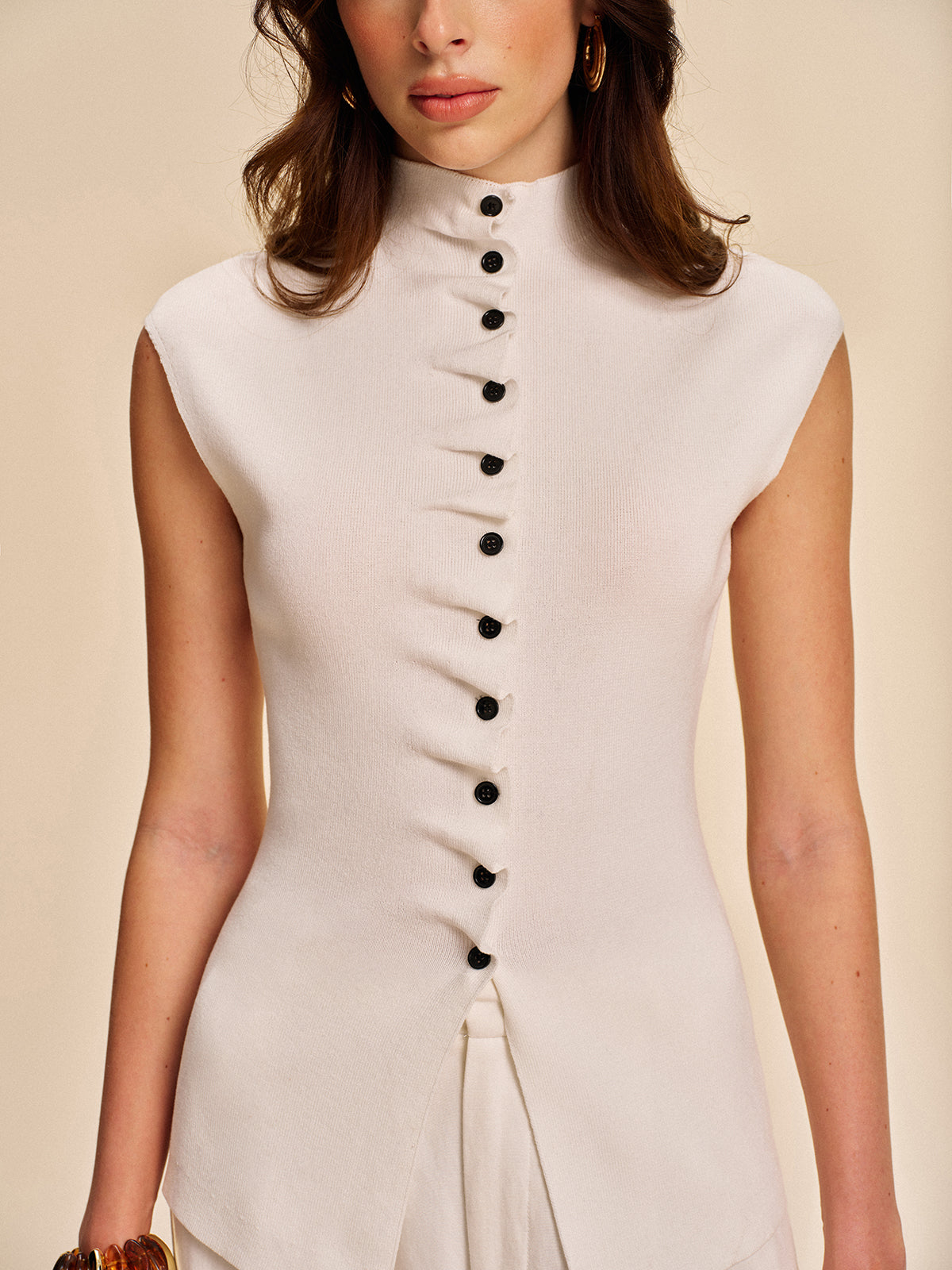 Gilet sans manches boutonné