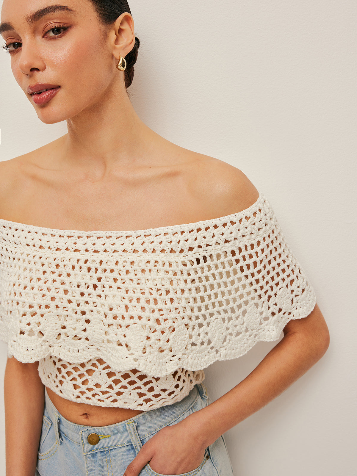 Haut en tricot ajouré à épaules dénudées