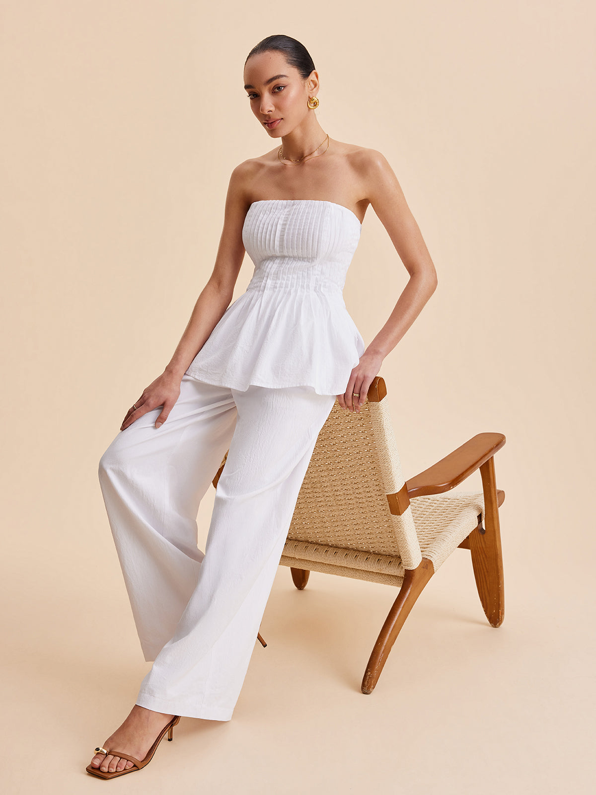 Gefaltetes trägerloses Peplum-Top aus Baumwolle