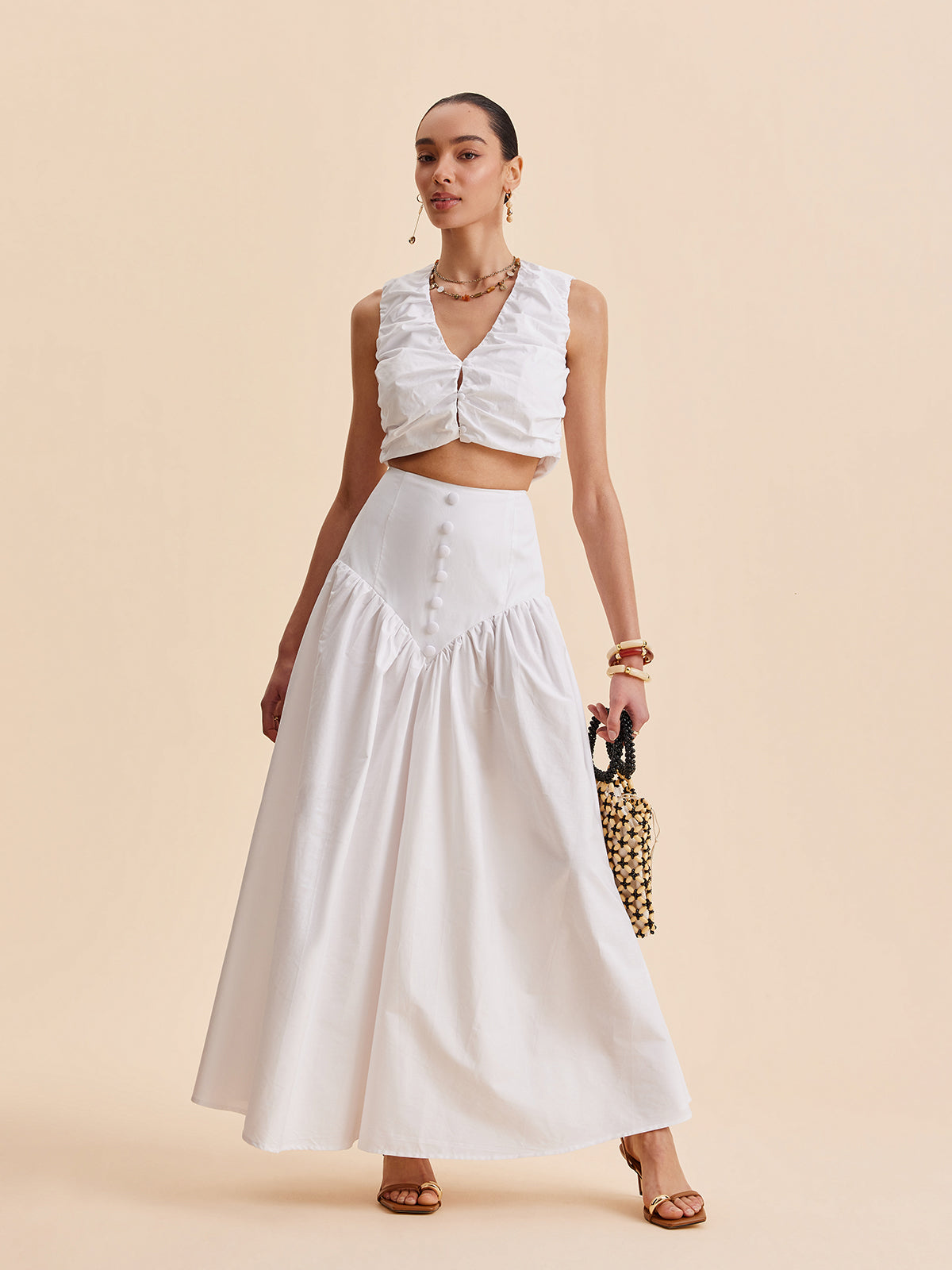 Ensemble crop top froncé et jupe boutonnée