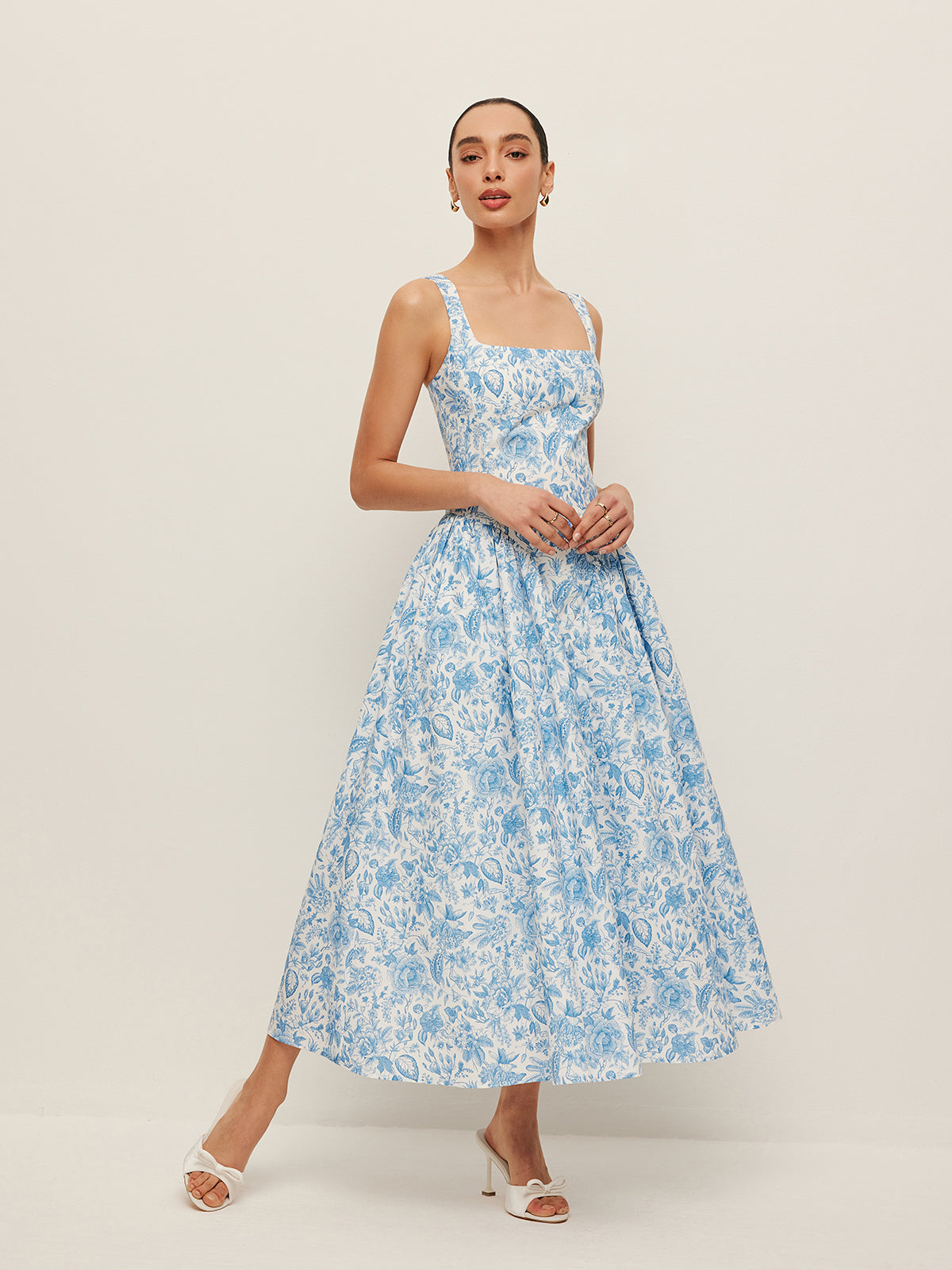 Bedrucktes Kleid mit eckigem Ausschnitt und Taschen